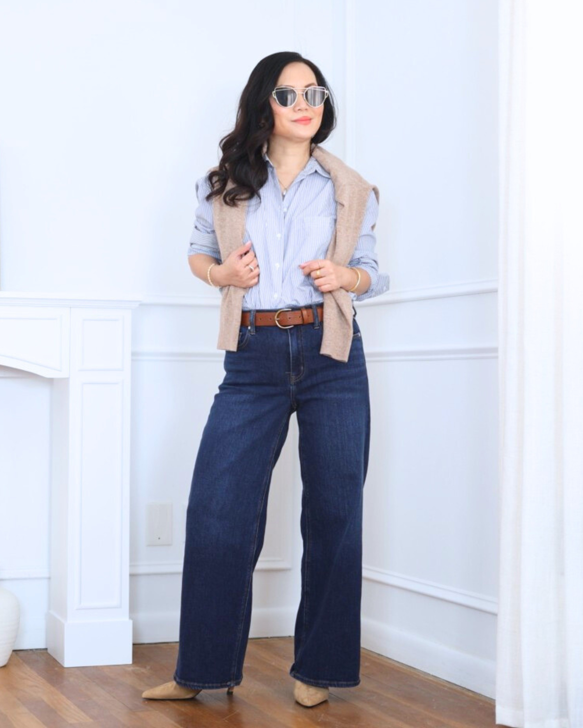 Classic and effortless — a button-down shirt with a sweater draped over the shoulders from Quince, paired with wide-leg jeans from Abercrombie. Clean, timeless, and always chic. I’m 5’2, wearing size XS.

#LTKPetite #LTKOver40 #LTKootd