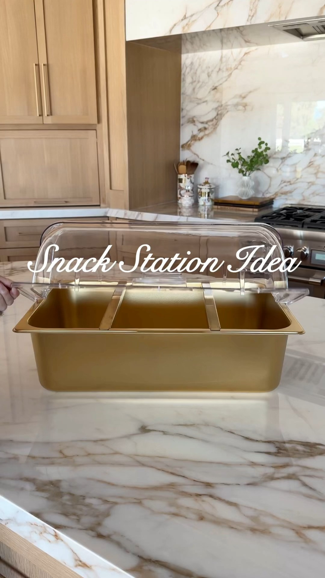 This six-compartment snacking station in gold with a clear lid feels equal parts serving tray and display piece. Something designed not just for convenience, but for presentation. The overall effect is organized, elegant, and inviting. It turns casual snacking into something a bit more intentional. Almost ceremonial, where choosing what to eat becomes part of the experience, guided by neatly separated options and a presentation that feels just a touch luxurious. 

 #LTKfoodie
