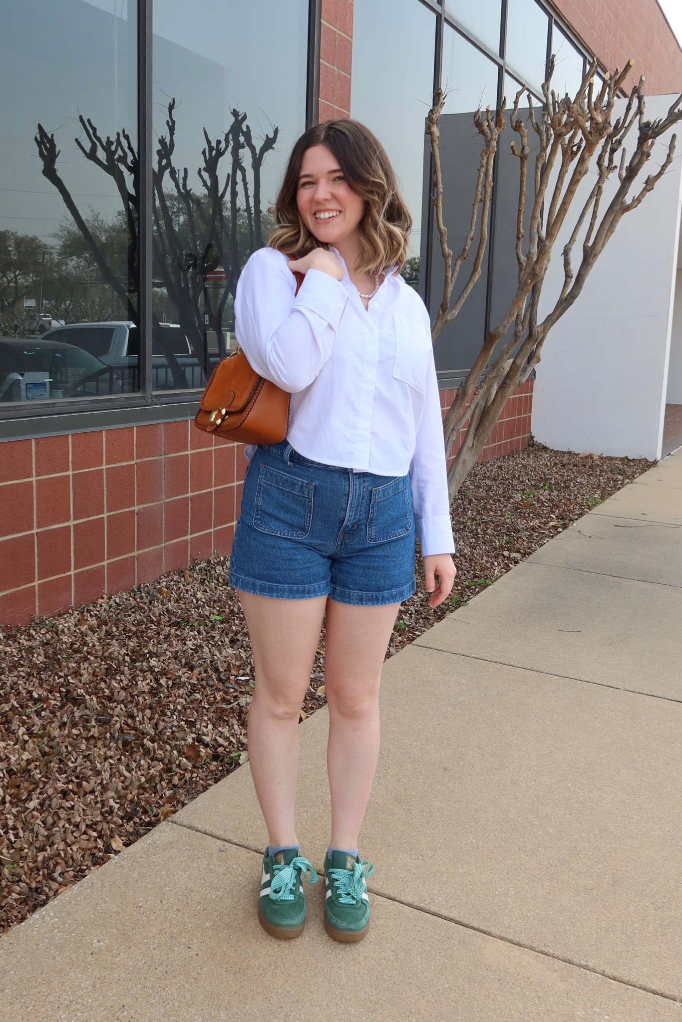 Daily outfit 
Abercrombie cropped shirt 
Madewell shorts 
Coach purse 
Gola sneaker 

#LTKStyleTip #LTKSpringSale