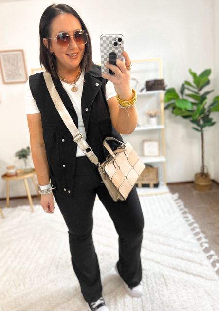 Styling these new flare leggings by the Avia brand at Walmart!  XL ribbed tee. XL denim vest. Amazon crossbody bag. Converse fit tts. This outfit will be on repeat for me this spring  

#LTKmidsize #LTKSeasonal #LTKfindsunder50