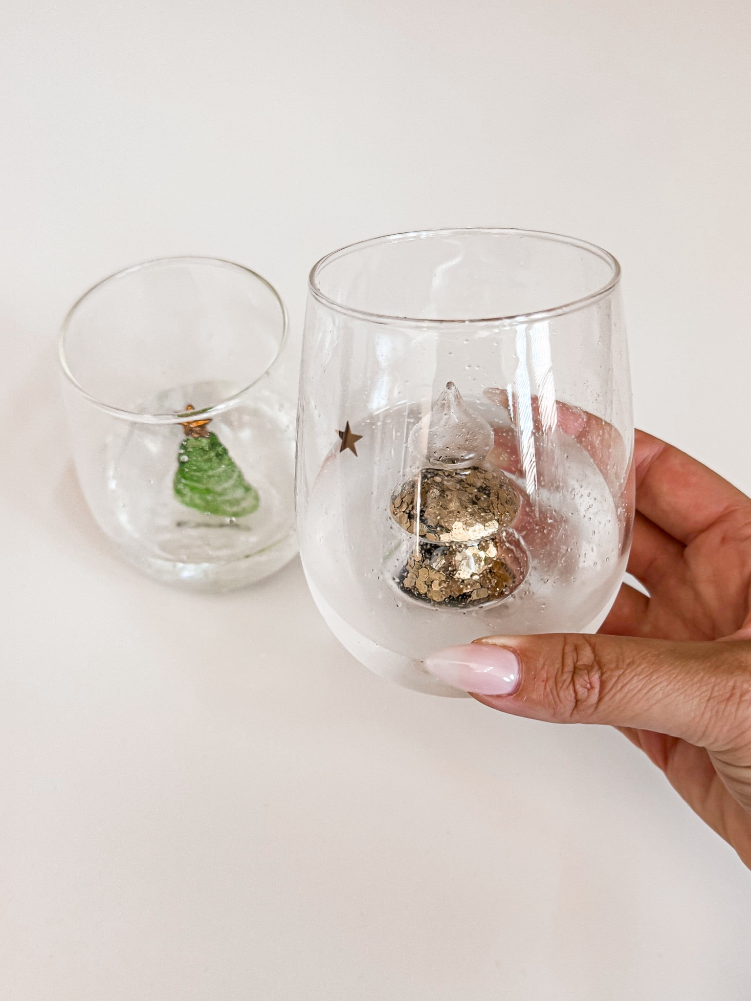These are the cutest Christmasd stemless wine glasses from Anthropologie! 
Christmas finds, Christmas entertaining, Christmas home 

#LTKSeasonal #LTKParties #LTKHome