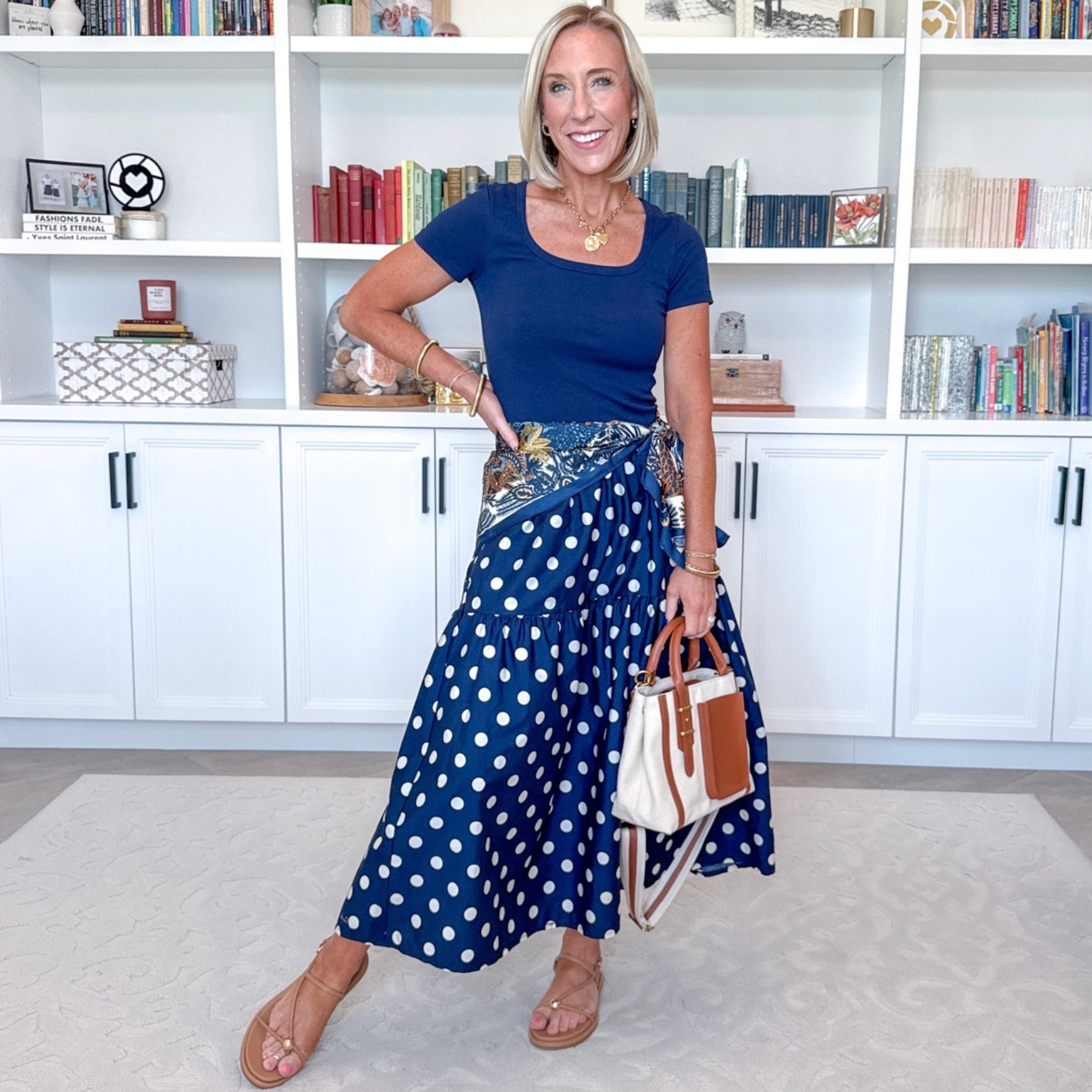 One polka skirt - styled 8 ways: • Midi skirt - size XS. Not lined but not see through. Elastic waistband and pockets! Navy top - size small.

#LTKootd #LTKSeasonal #LTKOver40