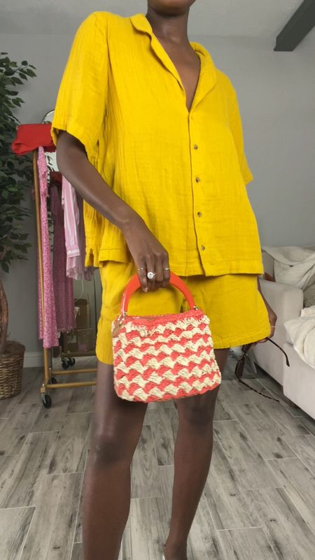 Easy vacation outfit! Yellow crinkle gauze button down top and shorts, silver sandals and a mini straw bucket bag  

#LTKVideo #LTKTravel #LTKFindsUnder100