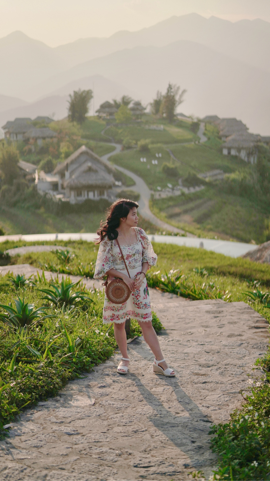 Serene mountain views at Topas Ecolodge. ⛰️☁️ This mountain retreat truly feels like it’s sitting in the clouds — surrounded by fresh mountain air, drifting fog, and clouds rolling through the valleys. 😍 The scenery here in Sa Pa is simply unreal. Easily one of the most magical mountain landscapes I’ve ever experienced while traveling in Vietnam. 🇻🇳 

Wearing a past-season Farm Rio dress for this photoshoot — linking similar resortwear styles I’m loving at the moment here on LTK! 🌿 #farmrio #resortwear  #travelinspo

#LTKSaleAlert #LTKPetite #LTKTravel