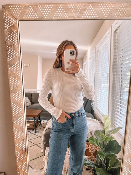 Calvin Klein Finds✨ wearing a size small white ribbed top and size 25 jeans 

#LTKstyletip #LTKsalealert