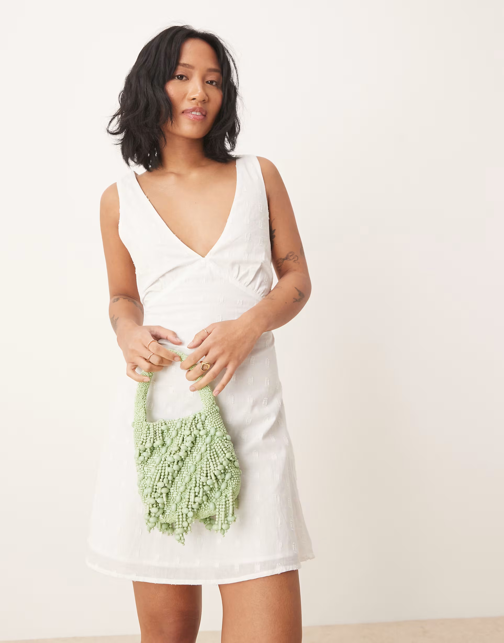 ASOS DESIGN beaded purse in green | ASOS (Global)