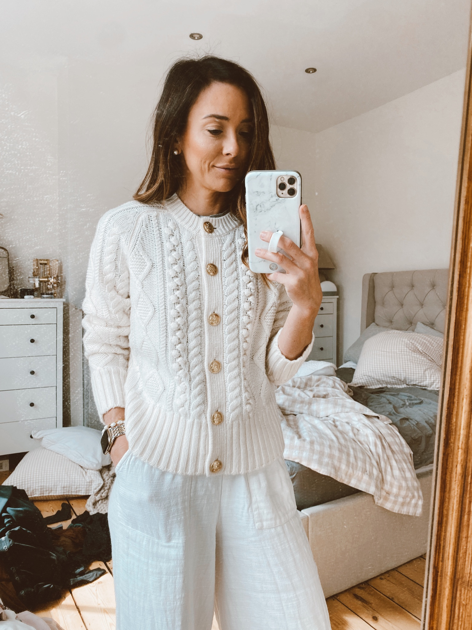 Cable knit cardigan with gold buttons on sale this weekend // 40% off with code SHOPNOW

#LTKsalealert