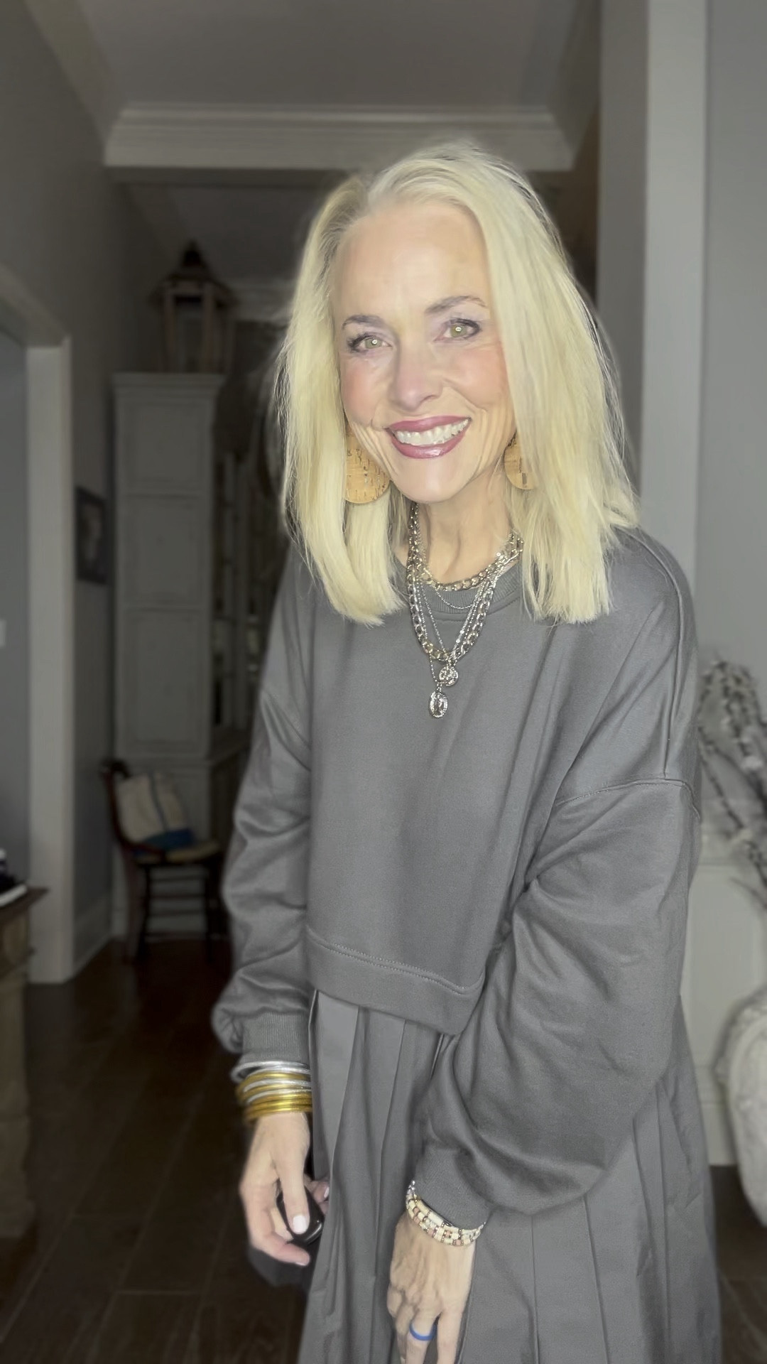 And my love affair with the FP Eleanor look for less continues with this dark grey version from the brand Anrabess on Amazon. Of all the brands that carry a version of this dress, Anrabess and Ugerlov are the two I’ve found to be the highest quality and the most consistent in fit. If I order from Anrabess (like this one) I size up one to a large for added length. In the Ugerlov, I can stay with my true size medium. This brand comes S-XL. I am also linking the Ugerlov brand here, as well because it is on sale today, but it does not offer a dark grey color option. 

I’ve paired it today with the sheer version of black fleece-lined tights and black cowboy boots. I mixed silver and gold jewelry together and added my favorite cork leather earrings from Nickel and Suede. This earring style comes in several different sizes, and this is the largest size. 

As a reminder, I am 53, 5’8, and 140 lbs. 

#LTKmidsize #LTKover40 #LTKplussize