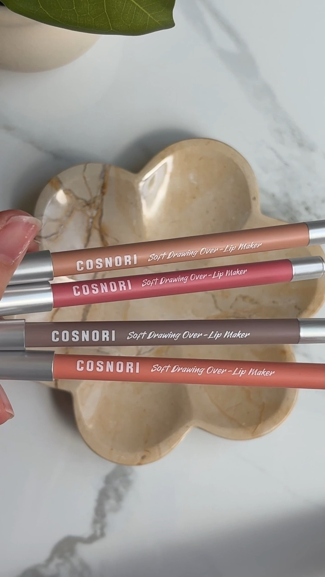 Not a lip liner pro? Same 🙋🏻‍♀️
The Cosnori Soft Drawing Over-Lip Liners make it so easy to get that trendy overlined lip look. I swatched 05, 06, 03, and 02 - all versatile, everyday shades that even beginners can pull off.

Which one's your pick?

#LTKFindsUnder50 #LTKBeauty