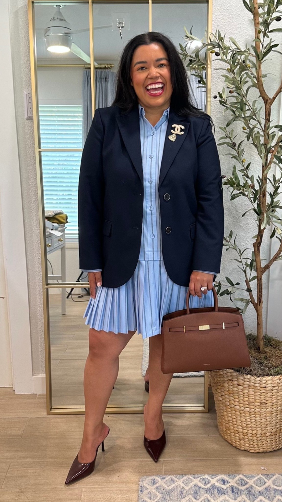 Perfect for work if you’re petite like I am! This Oxford shirt dress has the perfect pleating on the bottom. Im wearing a large in the dress.

I have a navy blazer on top and I’m wearing a size 14 and my new mules from BCBG are a new favorite of mine! 

My handbag is a new fall purchase, and it’s from DeMillier and I’m soo obsessed with it!

Fall looks, fall outfits, fall wardrobe staple, fall dress, fall shoes, fall handbag, classic look, fall workwear, fall office look Smiles and Pearls

#LTKMidsize #LTKWorkwear #LTKOver40