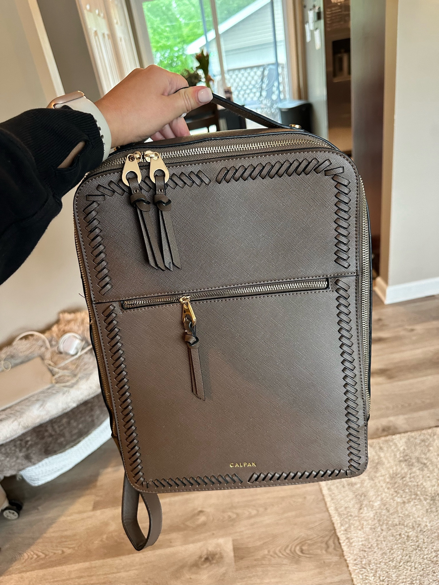 Calpak laptop backpack! Mine is in the color Mocha

#LTKworkwear #LTKtravel