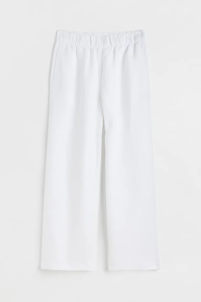 Relaxed-fit, wide-leg, ankle-length pants in a woven linen and viscose blend. High waist, waistba... | H&M (US + CA)