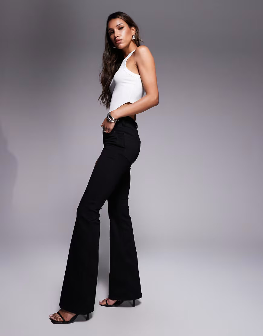 Good American good legs flare jeans in black | ASOS (Global)