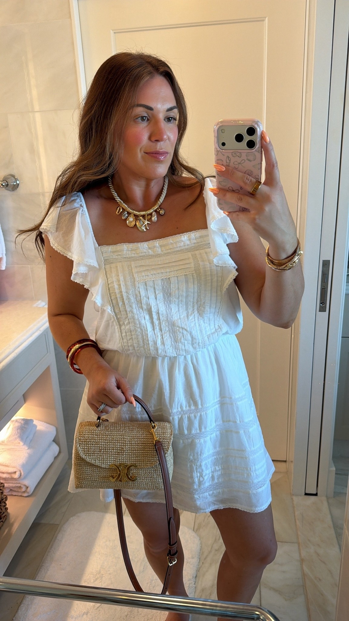 curvy midsize white mini dress look! wearing a size medium and it has shorts! added raffia and seashell accessories 🐚🤍

#LTKSeasonal #LTKMidsize #LTKTravel
