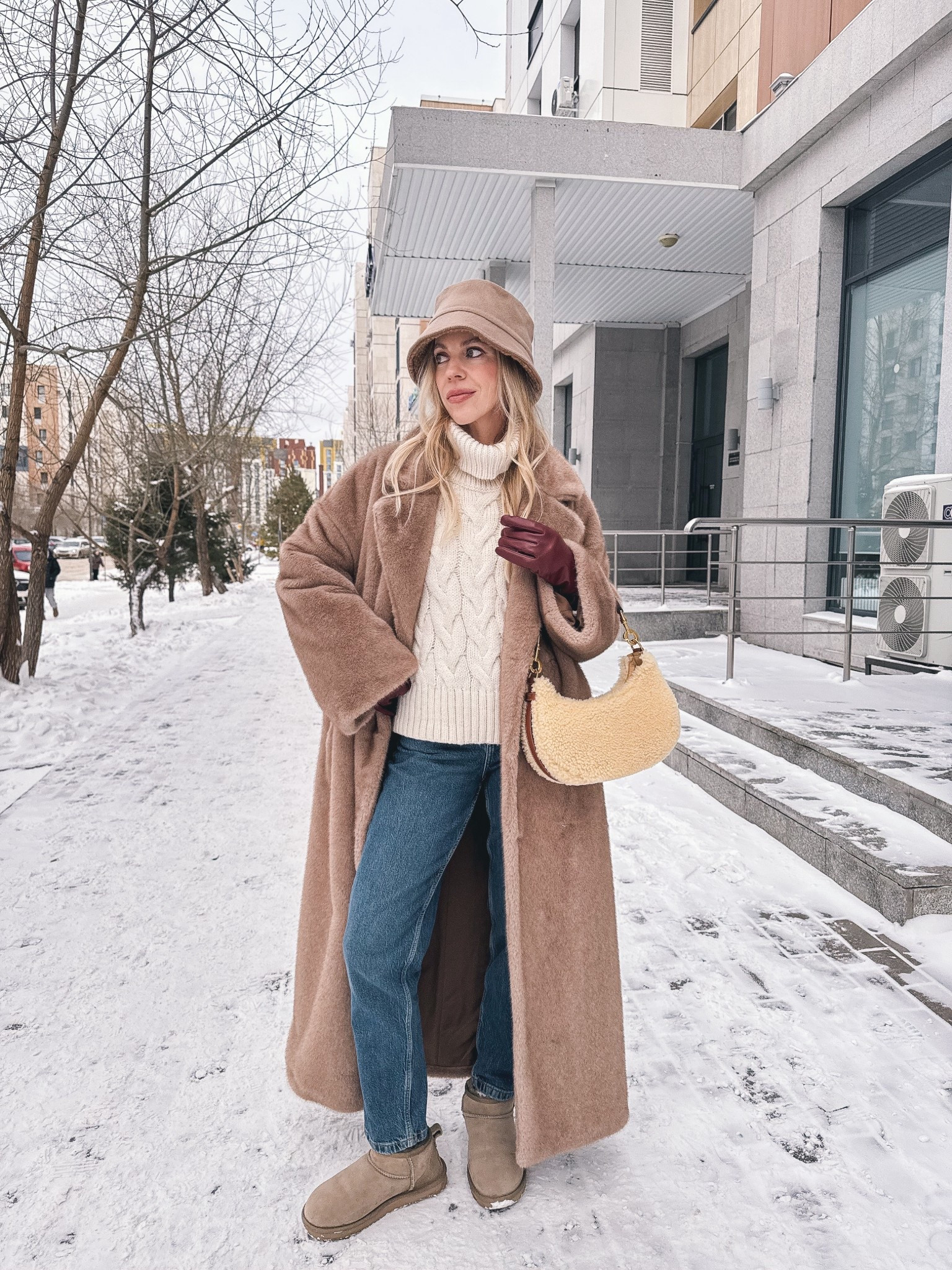 Beige camel fur coat, shearling fur bucket hat, cable knit sweater, Ugg ultra mini boots, shearling handbag

#LTKFindsUnder50 #LTKOver40 #LTKSeasonal