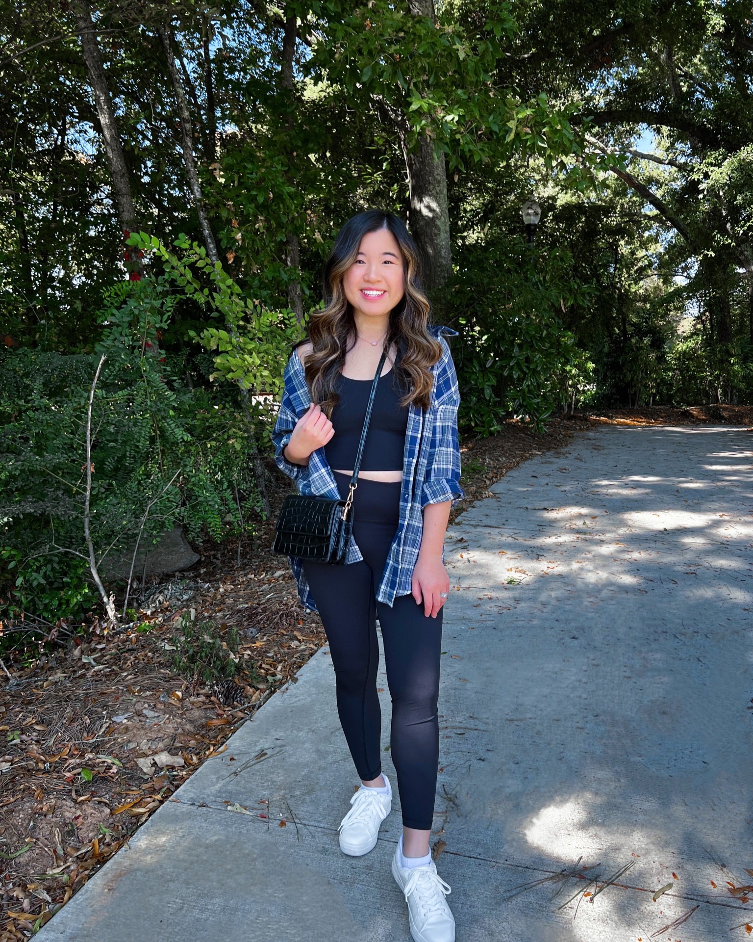 Casual fall outfit inspiration: Plaid shirt from Amazon (size small), longline tank from Amazon (size small, but I recommend sizing up), leggings from Pink Lily (size small), white sneakers from Pink Lily (size small)

#LTKU #LTKunder50 #LTKSeasonal