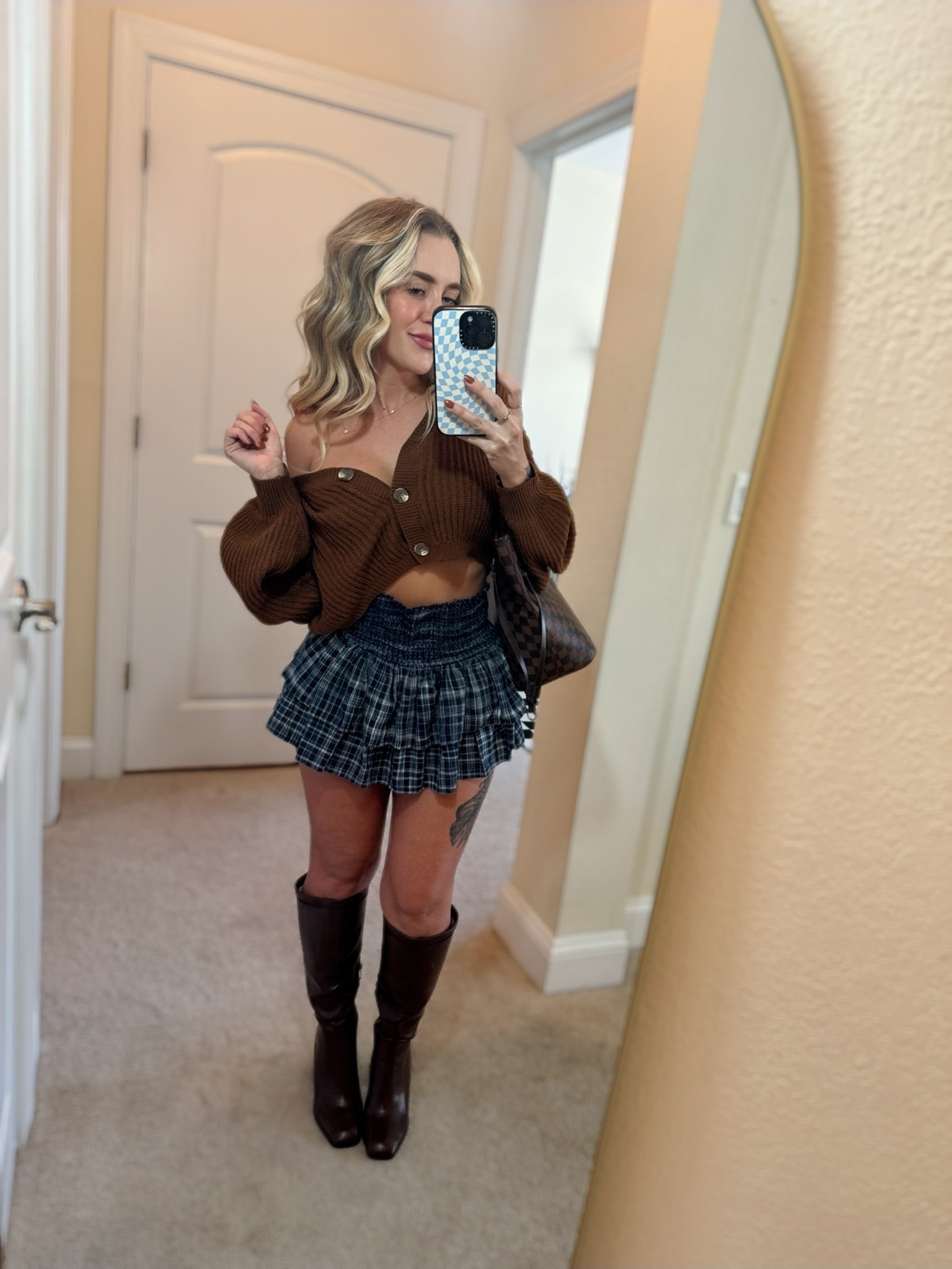 Fall outfit for hairstylists tall brown boots with skirts crop sweater 

#LTKHoliday #LTKTravel #LTKSaleAlert