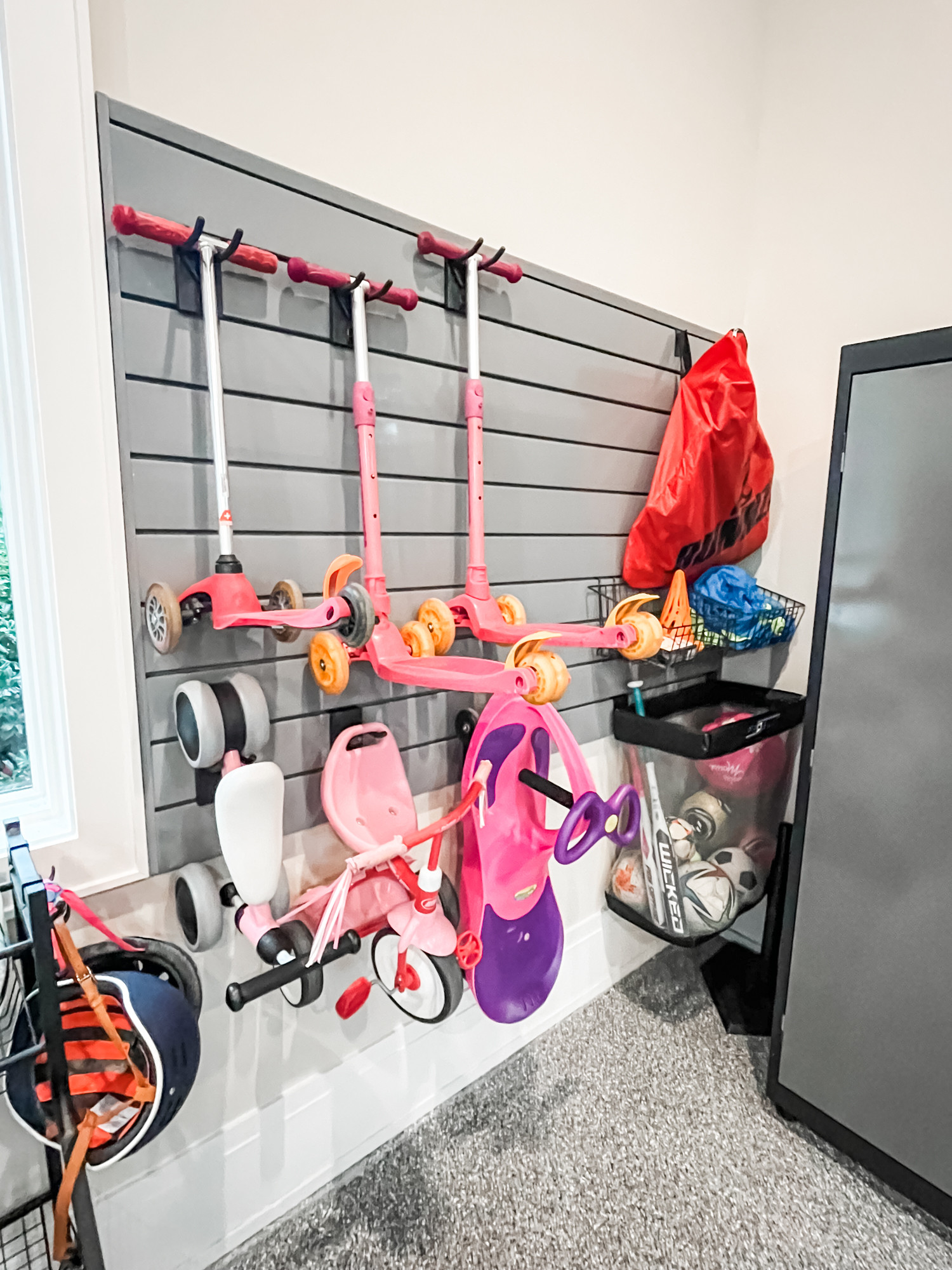 We've said it before and we'll say it again - keeping things off the floor in your garage is the easiest way to stay organized. These slat walls are so versatile and customizable and they make organization a breeze. 

 