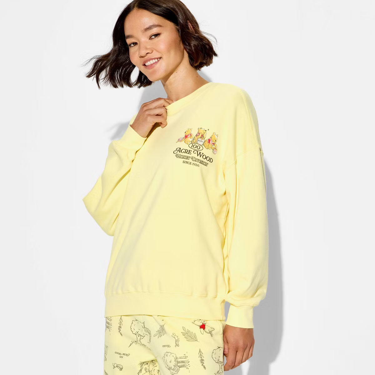 Women's Winnie The Pooh Graphic Pullover Sweatshirt - Honey Yellow | Target