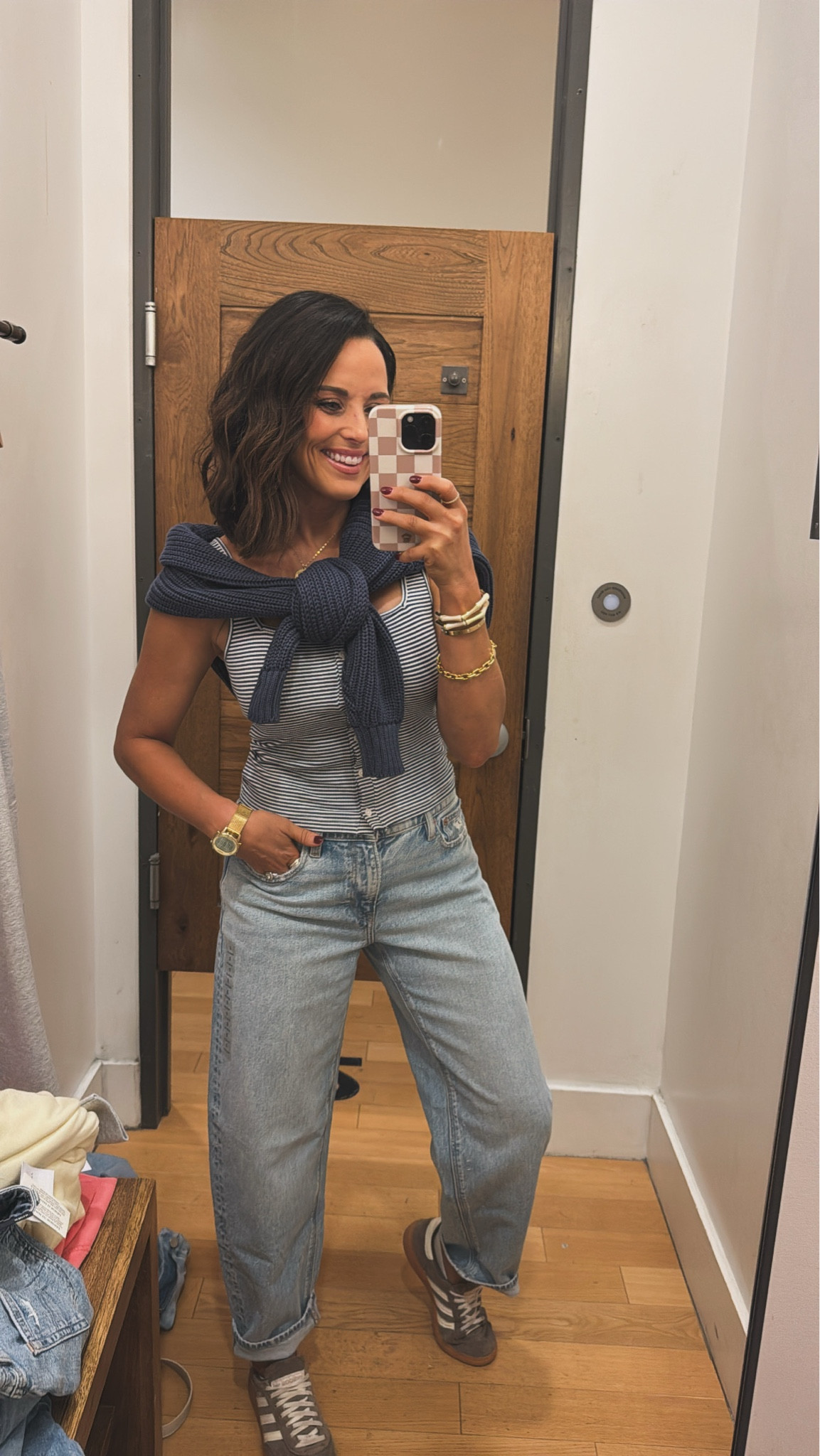 Already dreaming up warmer temps and spring outfits! How cute is this tank with the buttons down the front with this knit cardigan tied over the shoulders! Aprilwilks VintagePickin American eagle fashion finds women’s American eagle denim viral American eagle barrel jeans women’s early spring outfit ideas spring trends 

#LTKFindsUnder50 #LTKootd #LTKFindsUnder100