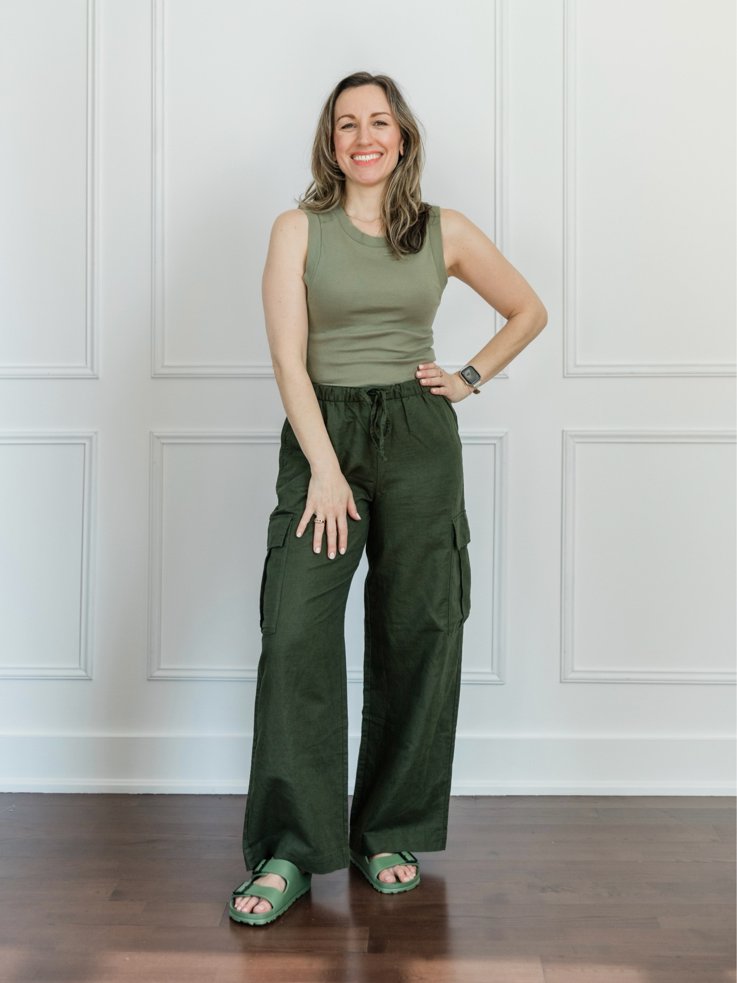 Cooling summer outfit with olive linen pants and green Birkenstock like sandals. Summer style, summer look, green outfit, casual sandals , linen outfit. 

#LTKFindsUnder50 #LTKOver40