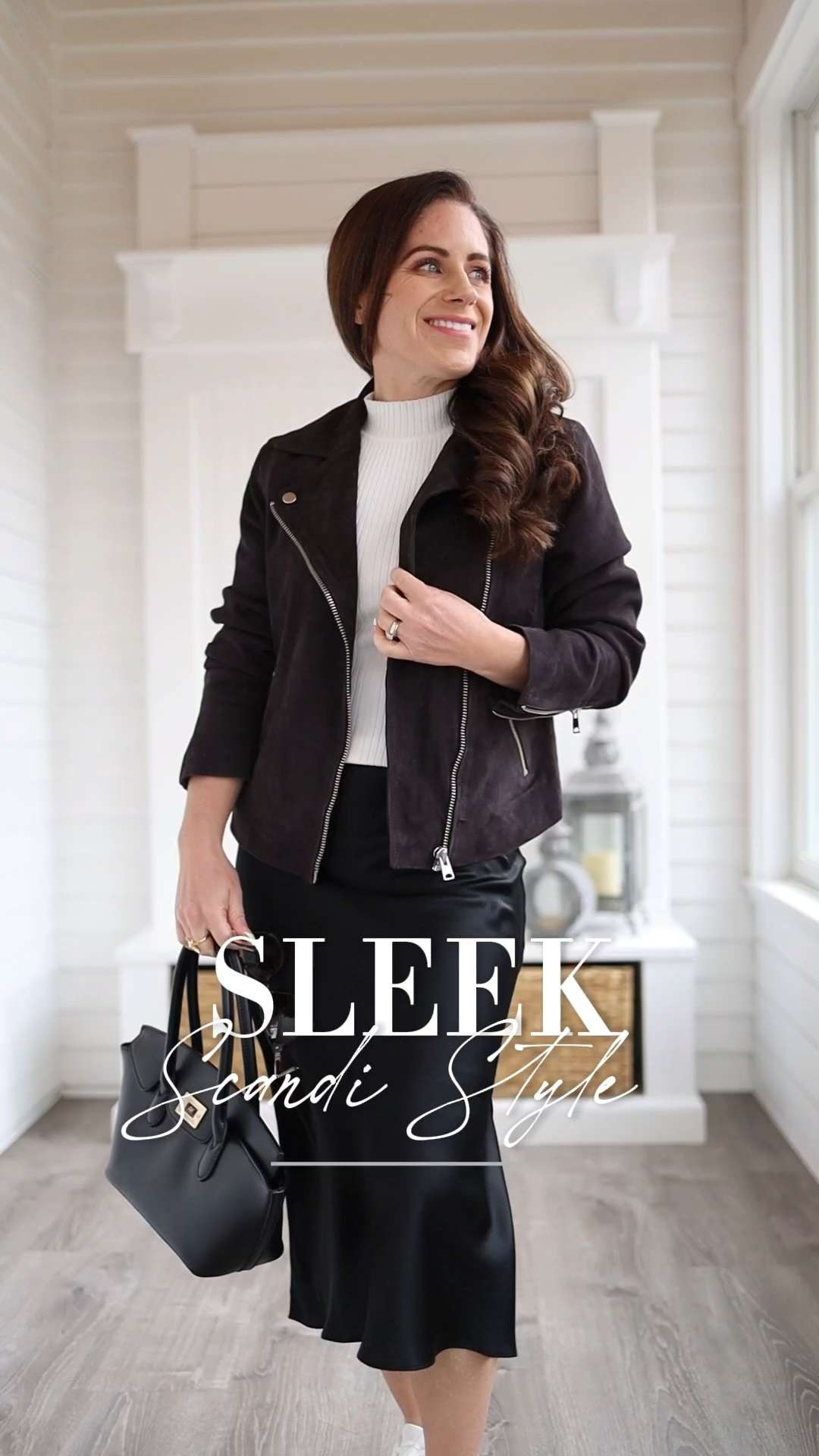 Want to recreate the effortless, minimalist cool of Scandinavian style? This is the uniform I see everywhere when I'm teaching abroad in Stockholm. Black silk midi skirt, white classic t-shirt or tank, structured jacket, white sneakers, and quality accessories. It's an outfit formula that works! All of these pieces are petite friendly, I'm wearing the XS in the Quince silk skirt and suede moto jacket. 4'11 for sizing reference. The sneakers are the All Day style from VIVAIA, I love these!! So sleek, comfy, and you can toss them in the washing machine. workwear | travel outfit | European vacation outfit | what to wear in Europe | travel look | minimalist style 

 #LTKPetite #LTKWorkwear #LTKTravel