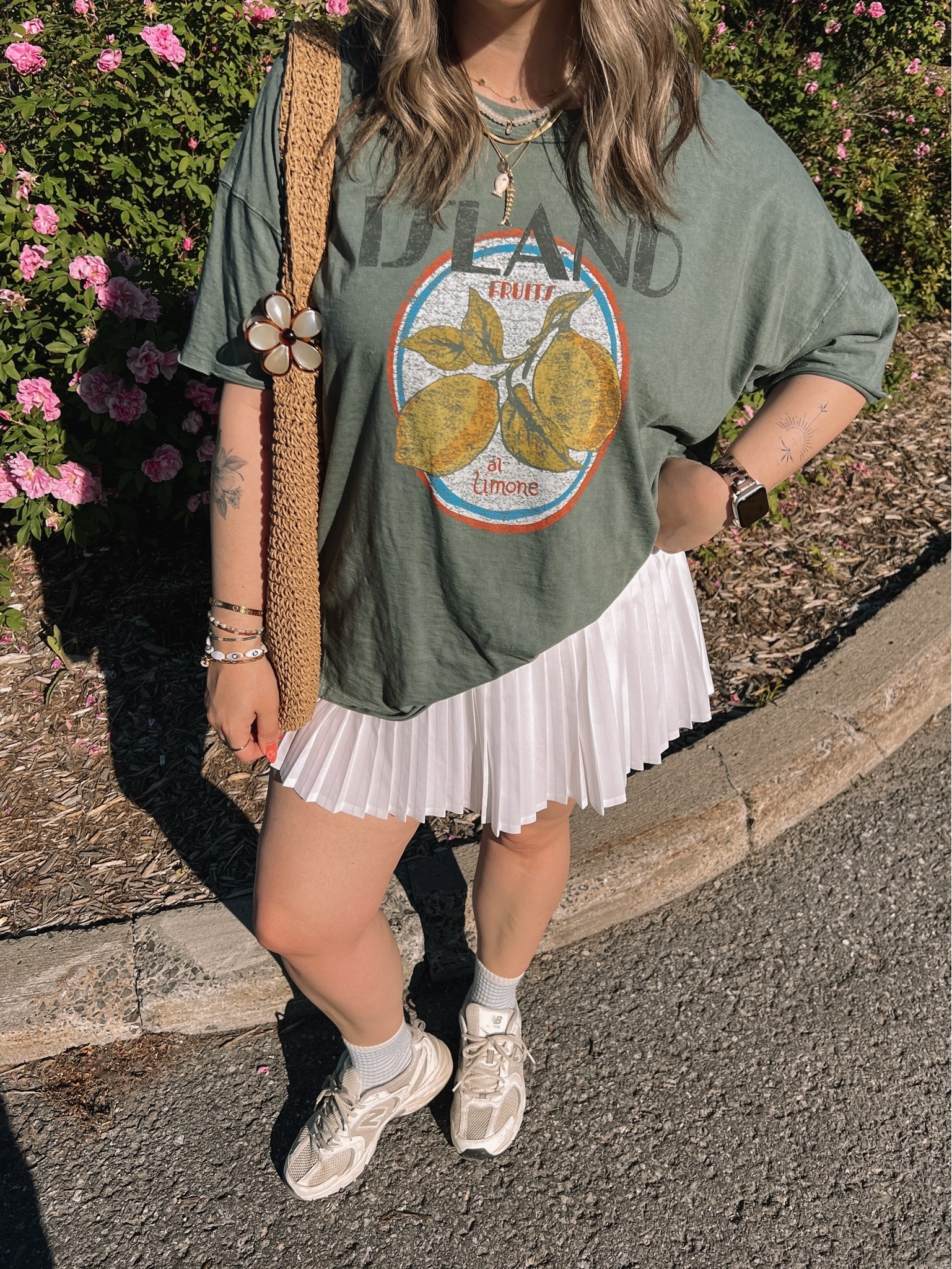 Casual spring to summer outfit! Wearing my usual size L in the graphic tee. Wearing M in the white tennis skirt, I bought it years ago & if I was ordering now I’d get L although M still fits. New Balance sneakers run a little big, I’m a 9.5-10 and wear a 9

#LTKsummer #LTKmidsize #LTKstyletip