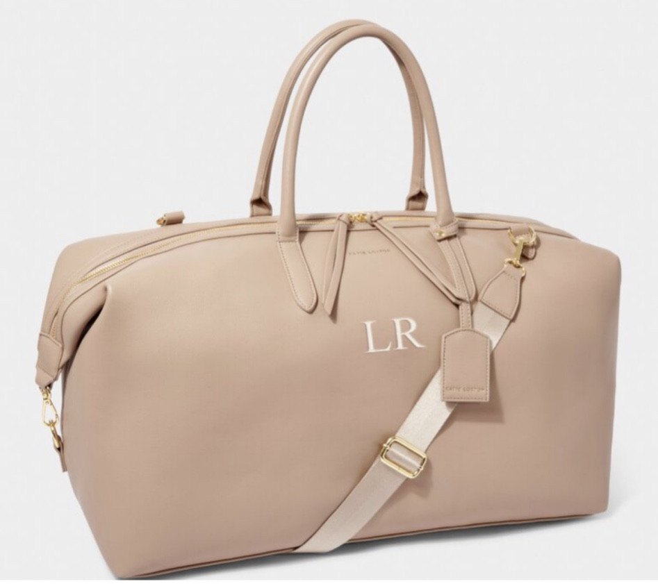 How gorgeous is the colour of this bag! Plus all its little details just make it the perfect travel bag #bag #katieloxton #travelbag

#LTKGiftGuide