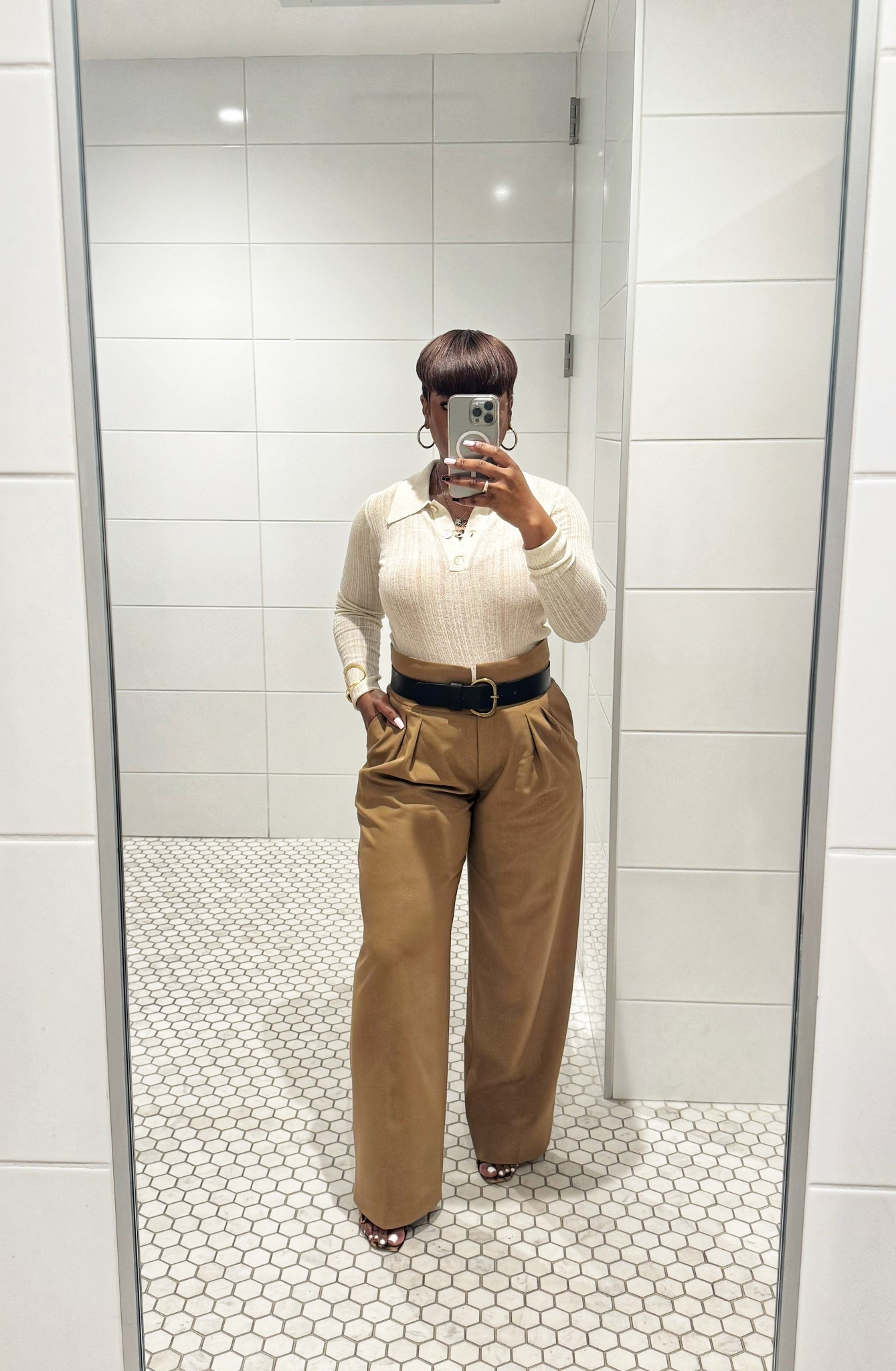 I struggle to purchase shirts, but one style I love is the Henley. This one is textured, and sheer in a very delicate fabric I hope I can keep in tact. I wore a rust colored tank underneath (for obvious reasons) and paired with one of my favorite trousers  

#LTKWorkwear