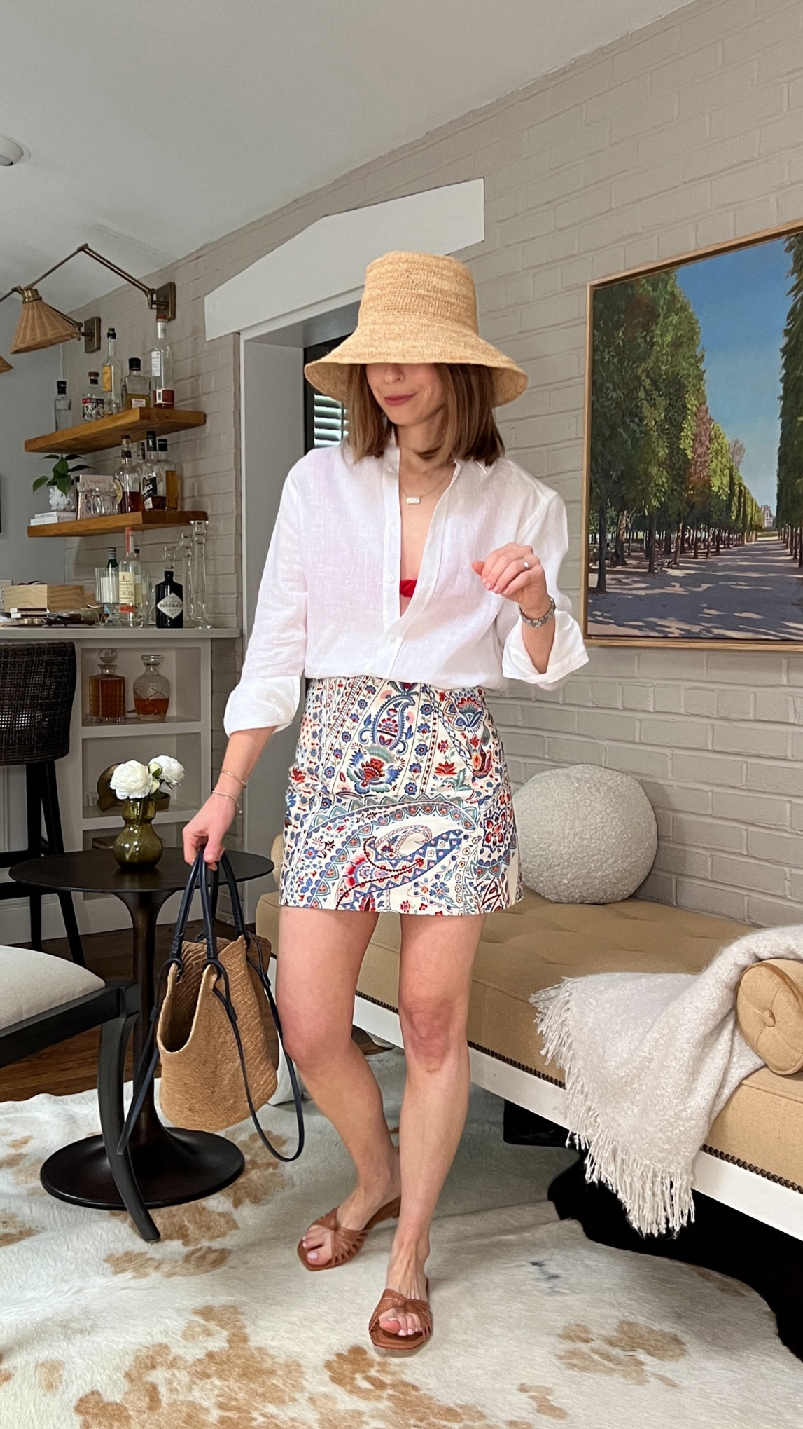 Sezane mini skirt 
White linen button up with nothing underneath
Tan sandals flat Mg style x Dillards 
SEzane straw tote bag
Raffia bucket hat Jenni kayne 


#LTKShoeCrush #LTKStyleTip #LTKItBag