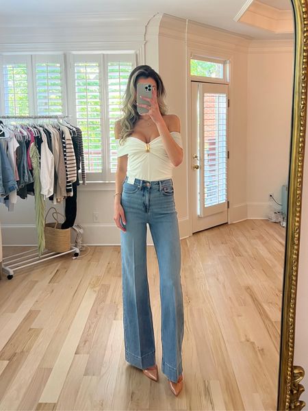 Great jeans. They come in petite regular and tall. I sized down to a size 25 tall. 
Wearing a size 4 in this top. I think it runs a little bit on the bigger side.  

#LTKstyletip