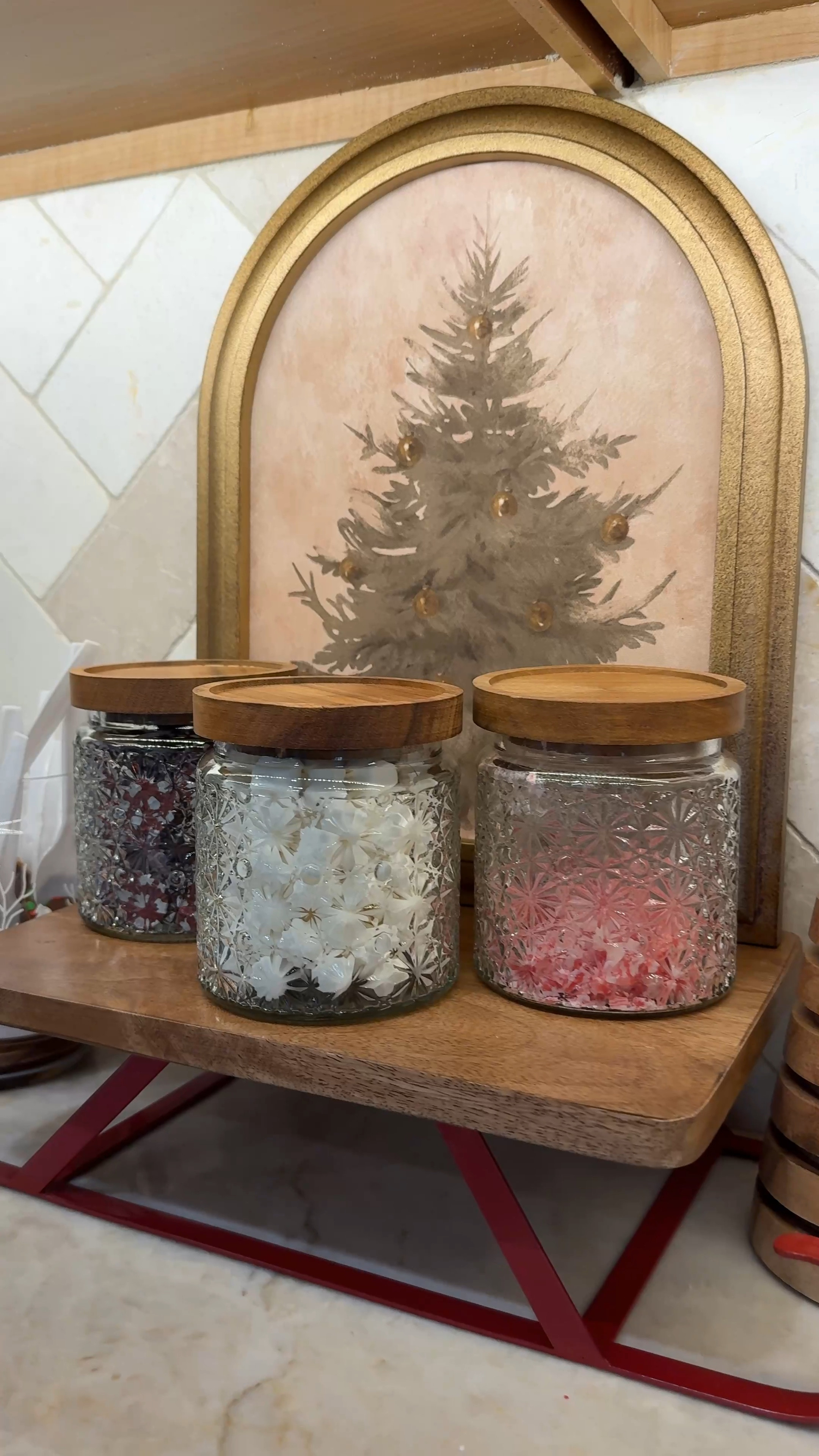 This hot cocoa bar is super easy to set up but always so magical! This year, I started with a sleigh tray, added a charming arch tree frame from Target, & used beautiful glass jars from TJ Maxx to hold the toppings. Then, I made some DIY stir sticks in a silicone muffin tray with melted chocolate, crushed peppermint, and sprinkles! Add a DIY hot coca bar to your holiday this season! It's been a favorite every year!! 

#LTKFamily #LTKHoliday #LTKHome