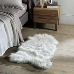 Everly Quinn Thurston Faux Sheepskin White Area Rug | Wayfair | Wayfair North America
