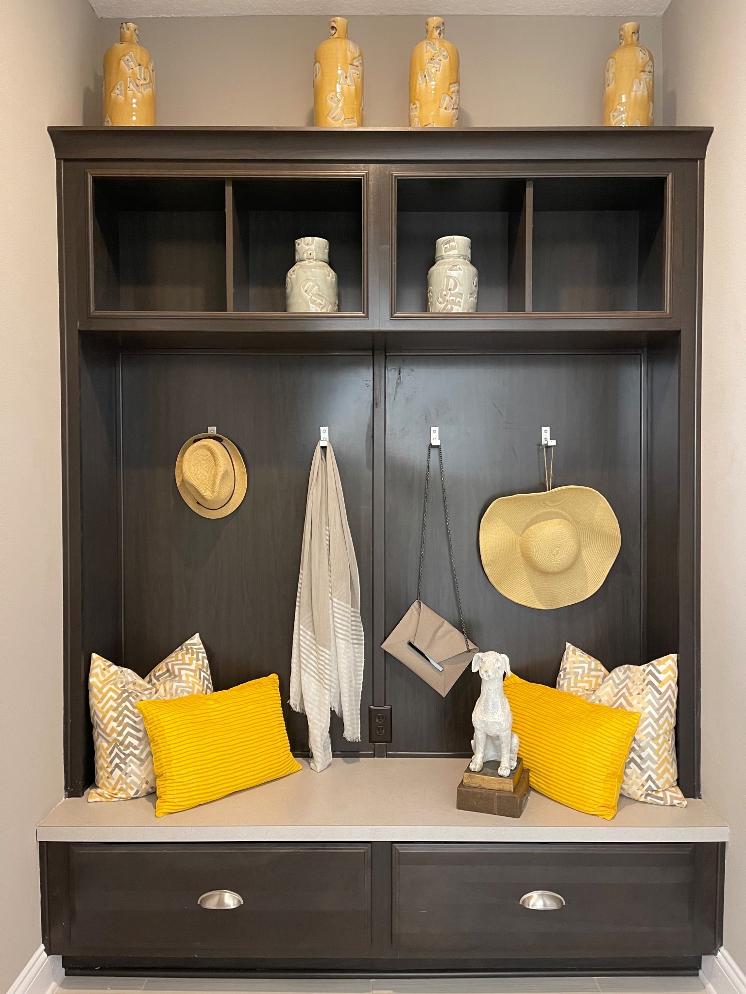 Mudroom or Drop Zone with yellow pillow accents and straw cowboy hat

#LTKStyleTip #LTKHome