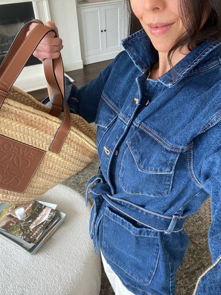 Love this new belted denim jacket for spring. It runs just slightly big. I’m wearing an XS. Also, my go-to spring and summer bag is this medium sized Loewe basket. 

Spring tote 
Spring outfit
Denim jacket with belt 
Springs finds 

#LTKover40 #LTKitbag #LTKSeasonal