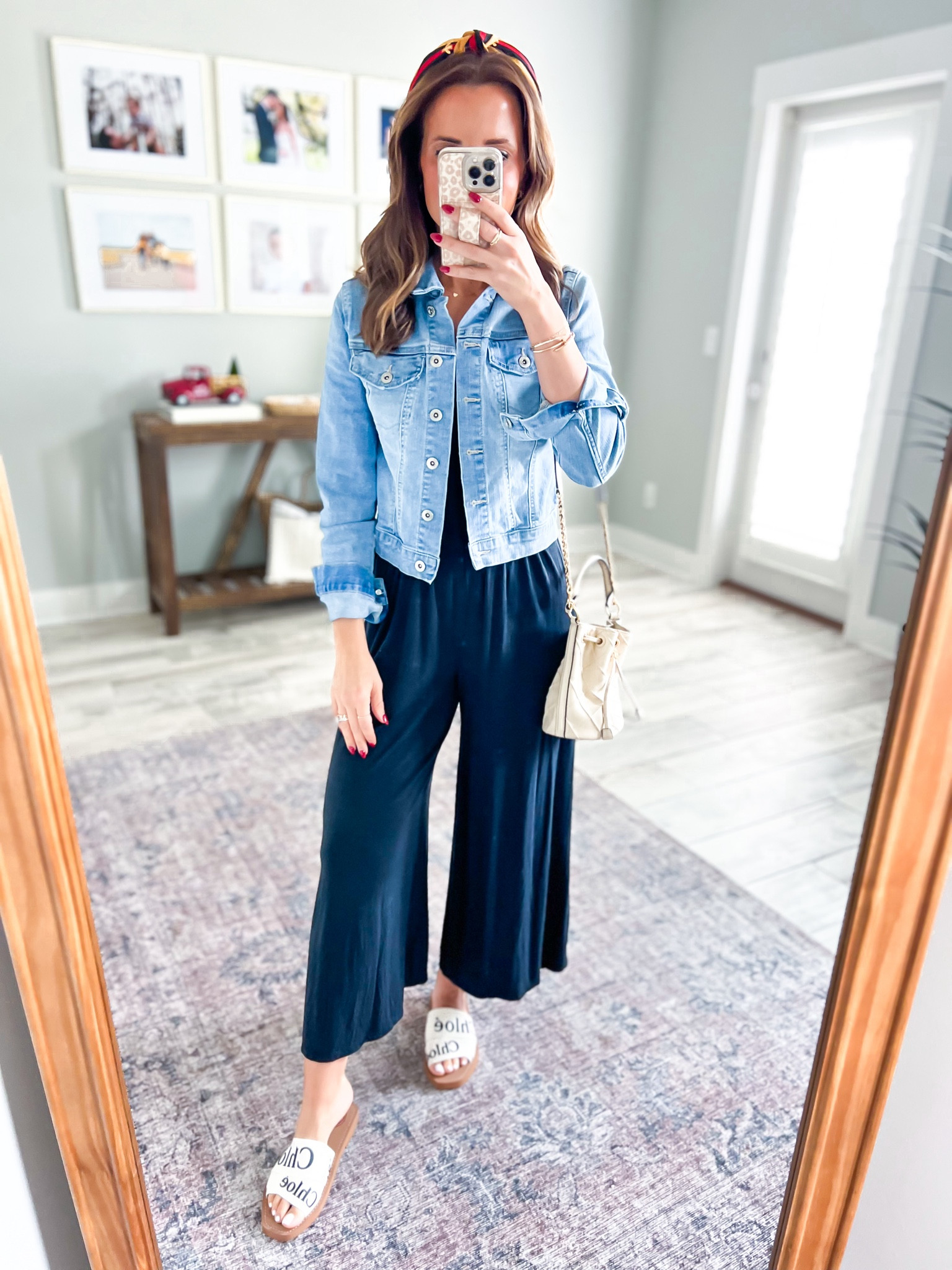 Casual outfit. Aritzia jumpsuit in XXS. Amazon denim jacket in XS. Chloe sandals (whole sizes only so size up if you’re a half size). Amazon headband. Tory Burch bucket bag. Travel outfit. Resort wear. Spring outfit. 

#LTKGiftGuide #LTKtravel #LTKshoecrush