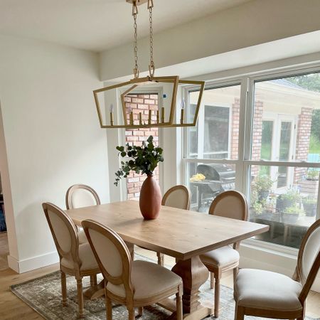 Add a wow factor to your small dining space with a cool light fixture 

#LTKhome #LTKfamily #LTKstyletip
