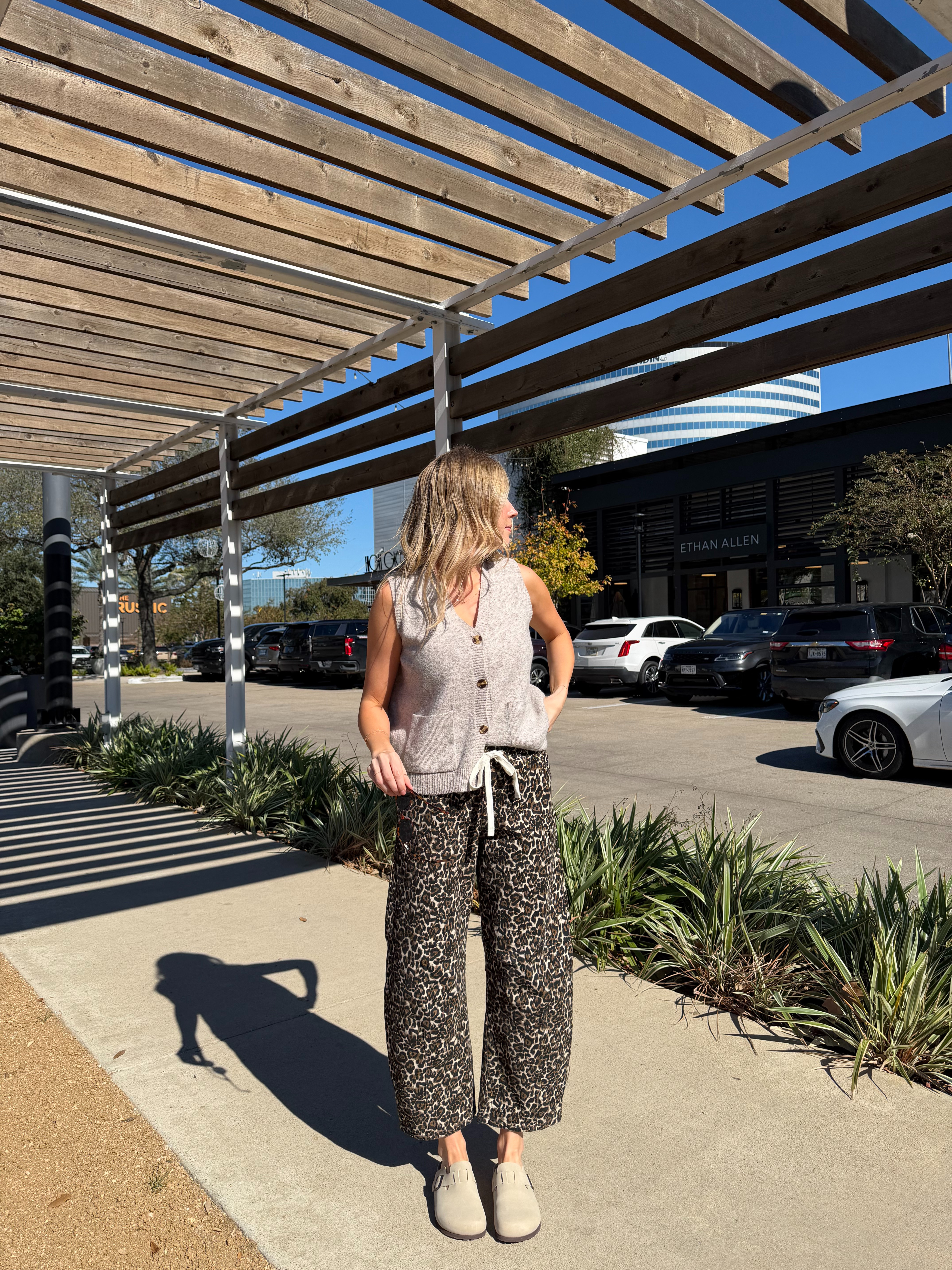 Casual yet cute mom outfit | S in sleeveless sweater and S in leopard denim! 

 #LTKootd #LTKFindsUnder50