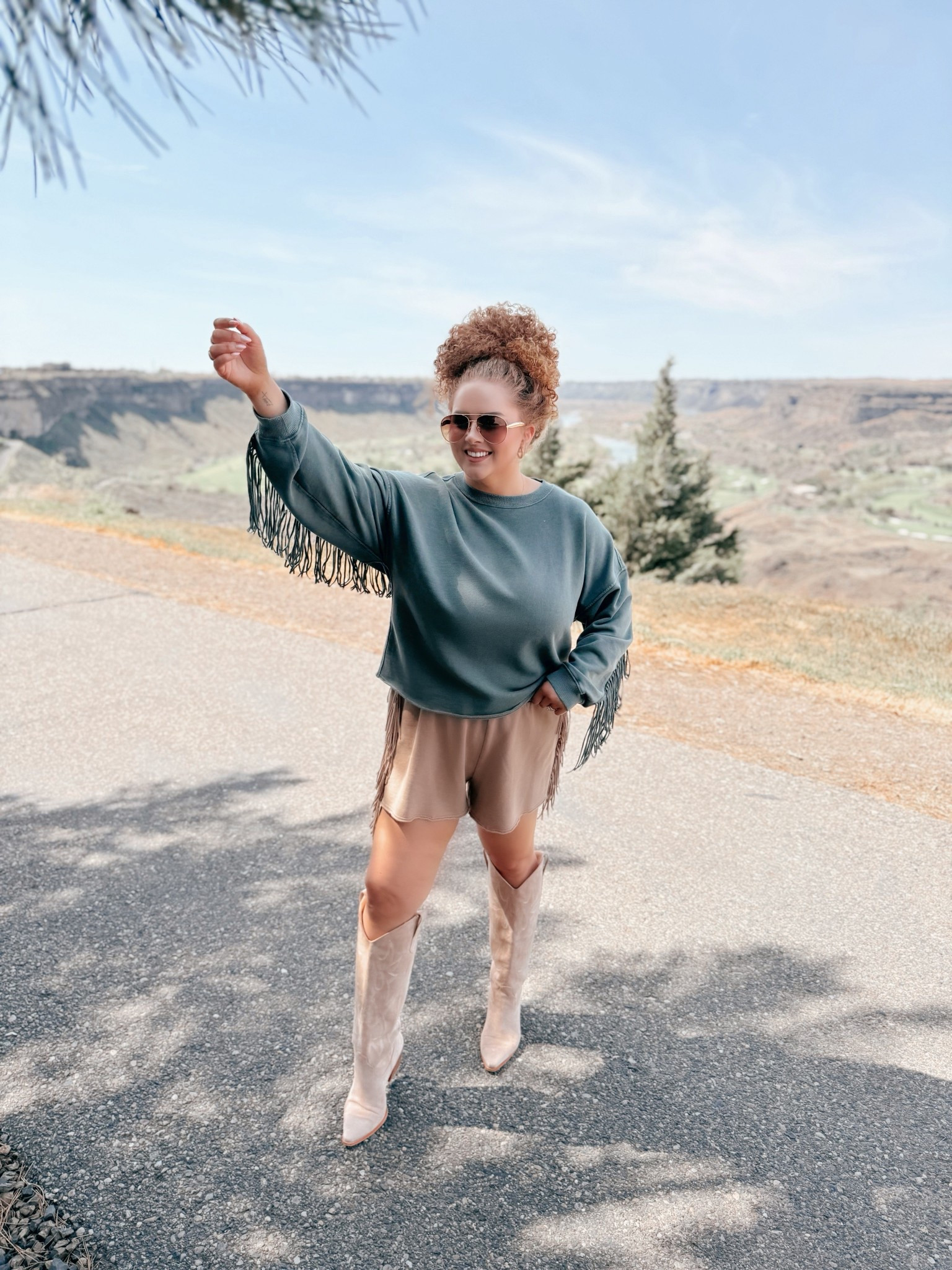 Living for this green fringe moment 🤍✨ It’s one of those outfits that does all the work for you, easy & comfy, but still makes a statement 🫶 The suede cowgirl boots pull it all together for the cutest boho western feel 🐆💫 green outfit | fringe outfit | western style | cowgirl boots outfit | suede boots outfit | khaki shorts outfit | matching set vibes | aerie outfit | Amazon fashion finds | boho western style | festival outfit ideas | concert outfit inspo | casual summer outfit | spring outfit ideas | effortless style | comfy cute outfit | neutral + green outfit | statement outfit inspo | everyday outfit ideas | trendy casual looks | western chic style 🤍🐆✨


#LTKootd #LTKFestival #LTKMidsize