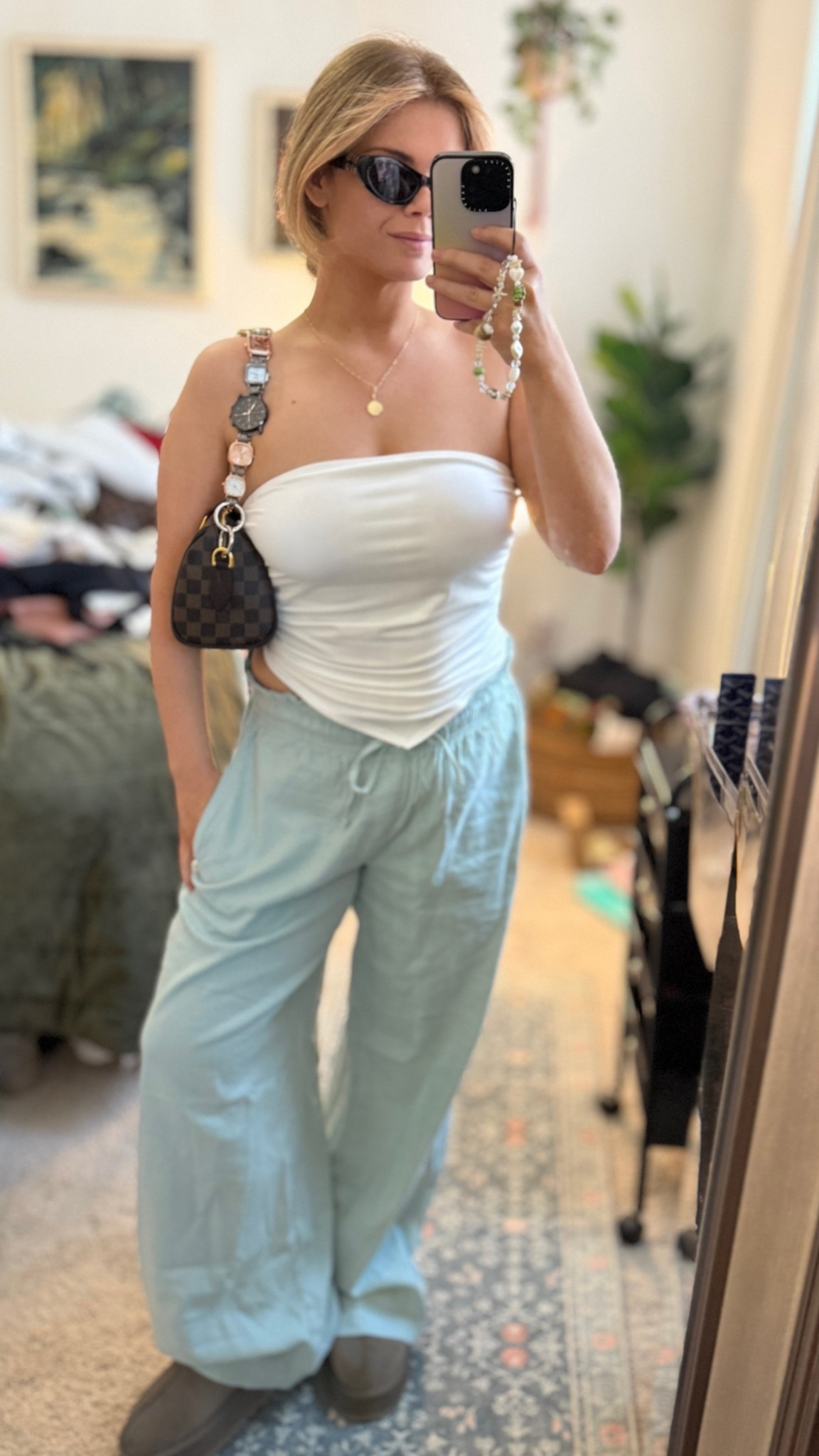 Top is a large and pants are a medium but are an oversized fit. 
Bag is from DH Gate and strap is Etsy! 

#LTKFindsUnder50 #LTKFindsUnder100 #LTKSeasonal