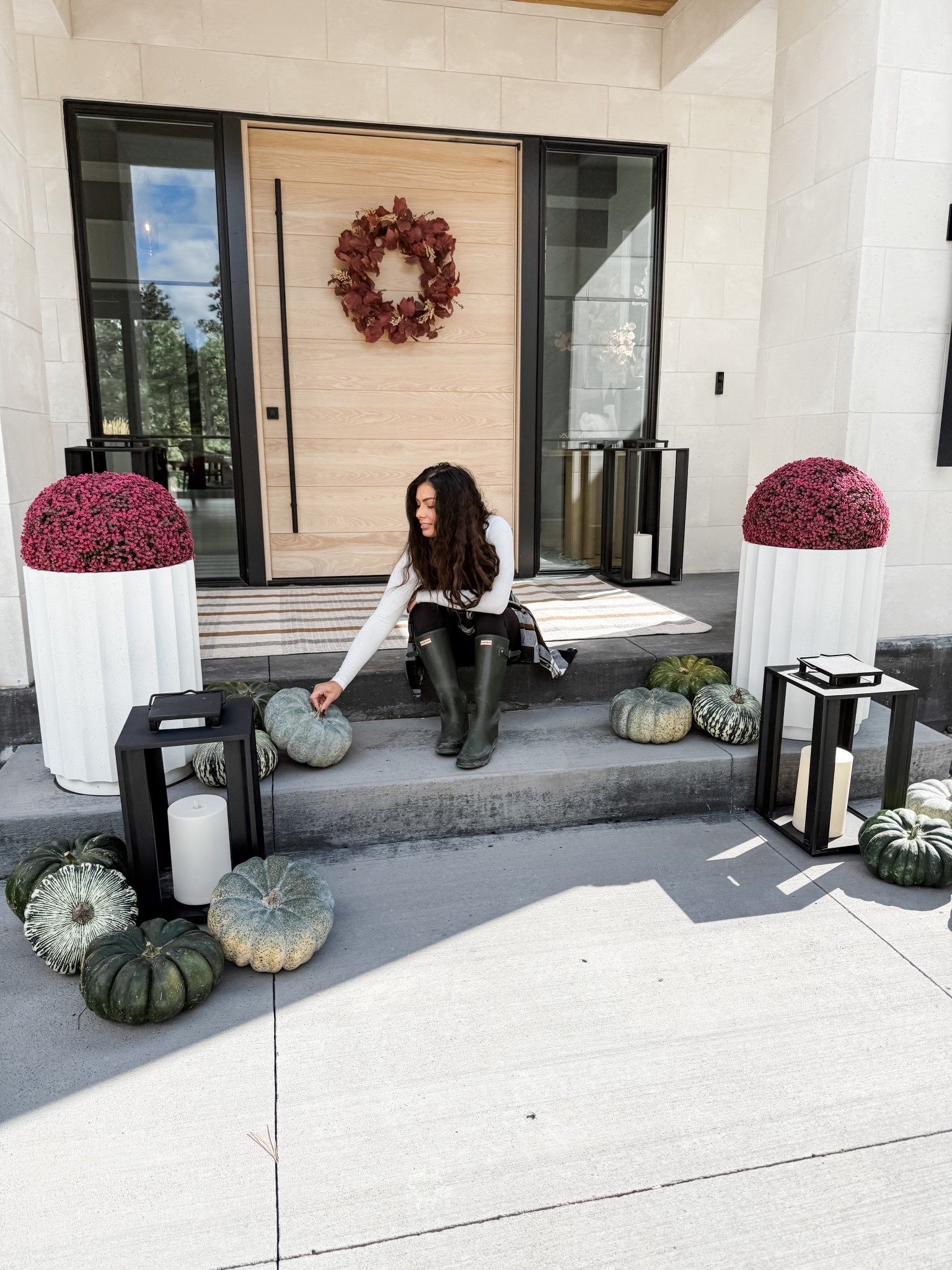 Loving this color combo for my simple fall porch. The green pumpkins are perfection! I have a mix of real and faux pumpkins. These planters and lanterns are sold out so I’m linking similar styles.

#LTKHome #LTKSeasonal #LTKStyleTip
