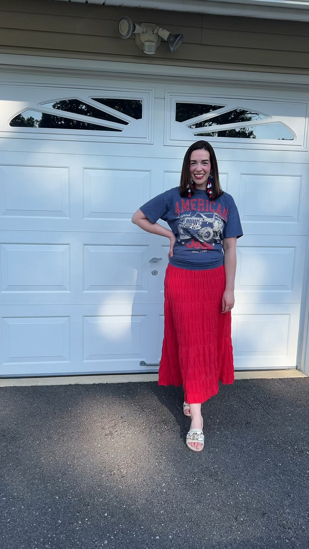 Blue American Ford graphic t-shirt (s). Red tiered maxi skirt (s). Beige gold chunky slides (8.5). #graphictshirt #bluetshirt #americanfordtshirt #tshirt #skirt #maxiskirt #redskirt #tieredskirt #slides #beigeslides #chunkyslides #fourthofjulyoutfit #summeroutfit 
summer outfits @tjmaxx @Marshalls @Steve Madden US @DSW

#LTKootd #LTKSeasonal
