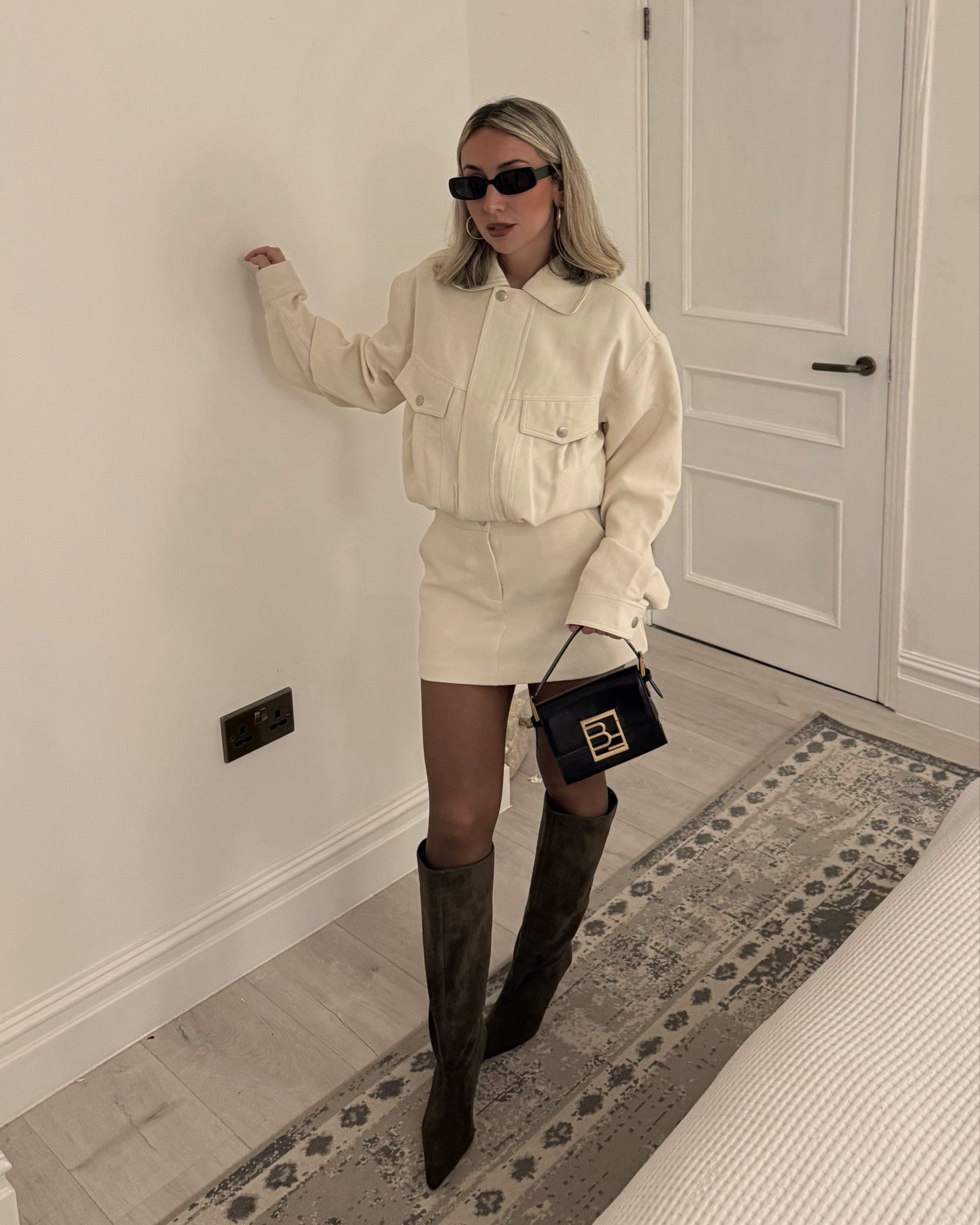 The 30-second co-ord uniform. 🕊️ the easiest way to look put together with zero effort!

White jacket and matching skirt co ord with khaki suede boots and brown tights and Statement mini bag. 

#LTKdatenight #LTKfestive #LTKpartywear
