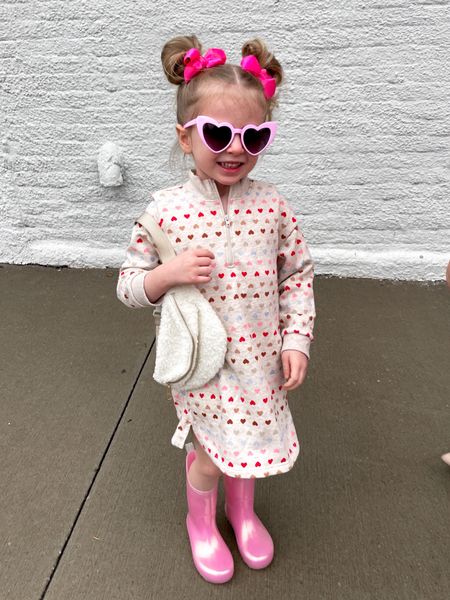 Toddler girl outfit, Valentine’s Day outfit, toddler girl dress, heart dress, pink Rainboots, pigtail bows, heart sunglasses, old navy, old navy kids 

#LTKkids #LTKsalealert #LTKSeasonal