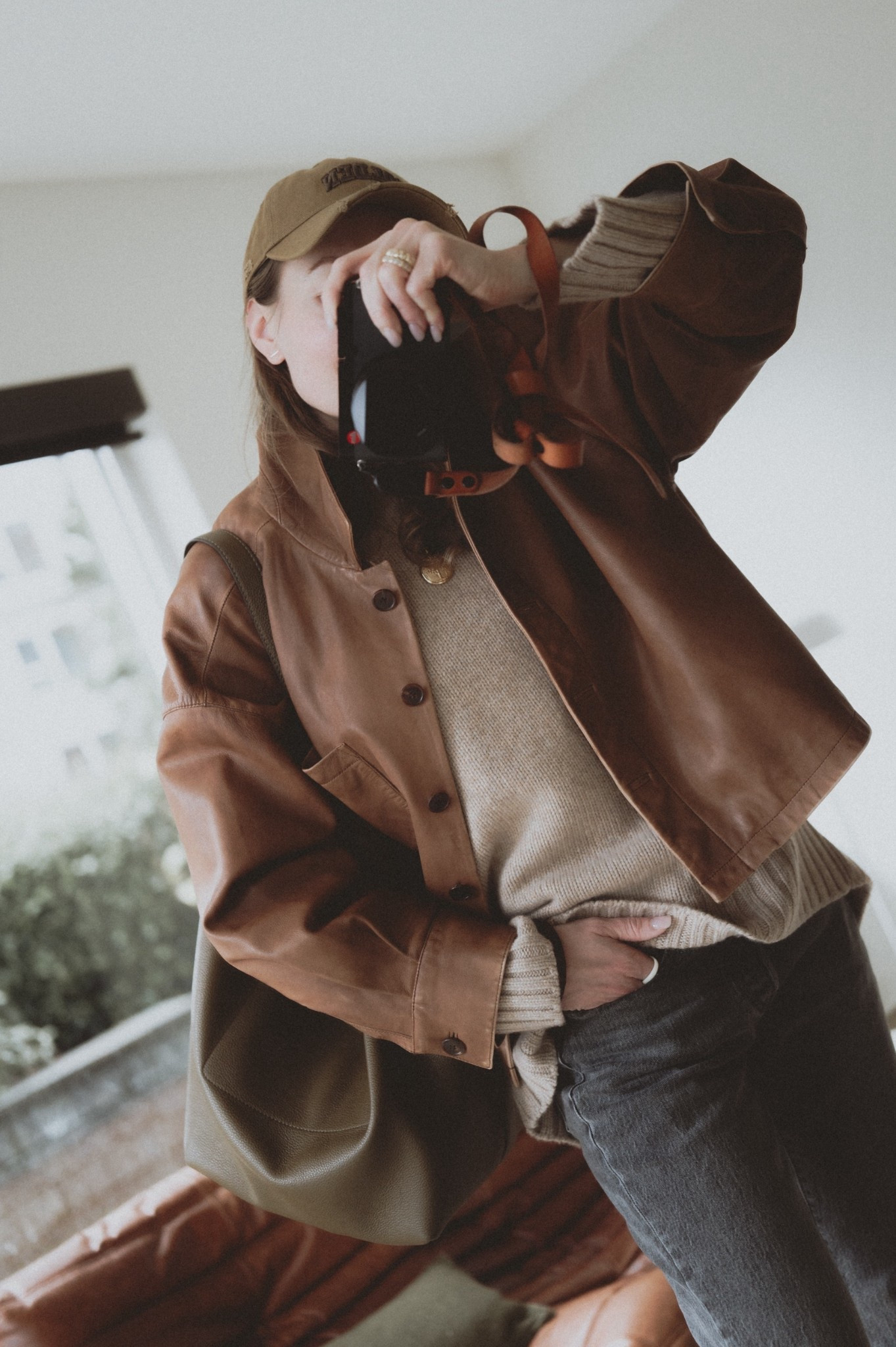 Sweater + jeans + leather jacket + hobo bag. 

#LTKootd #LTKmomlife #LTKSeasonal