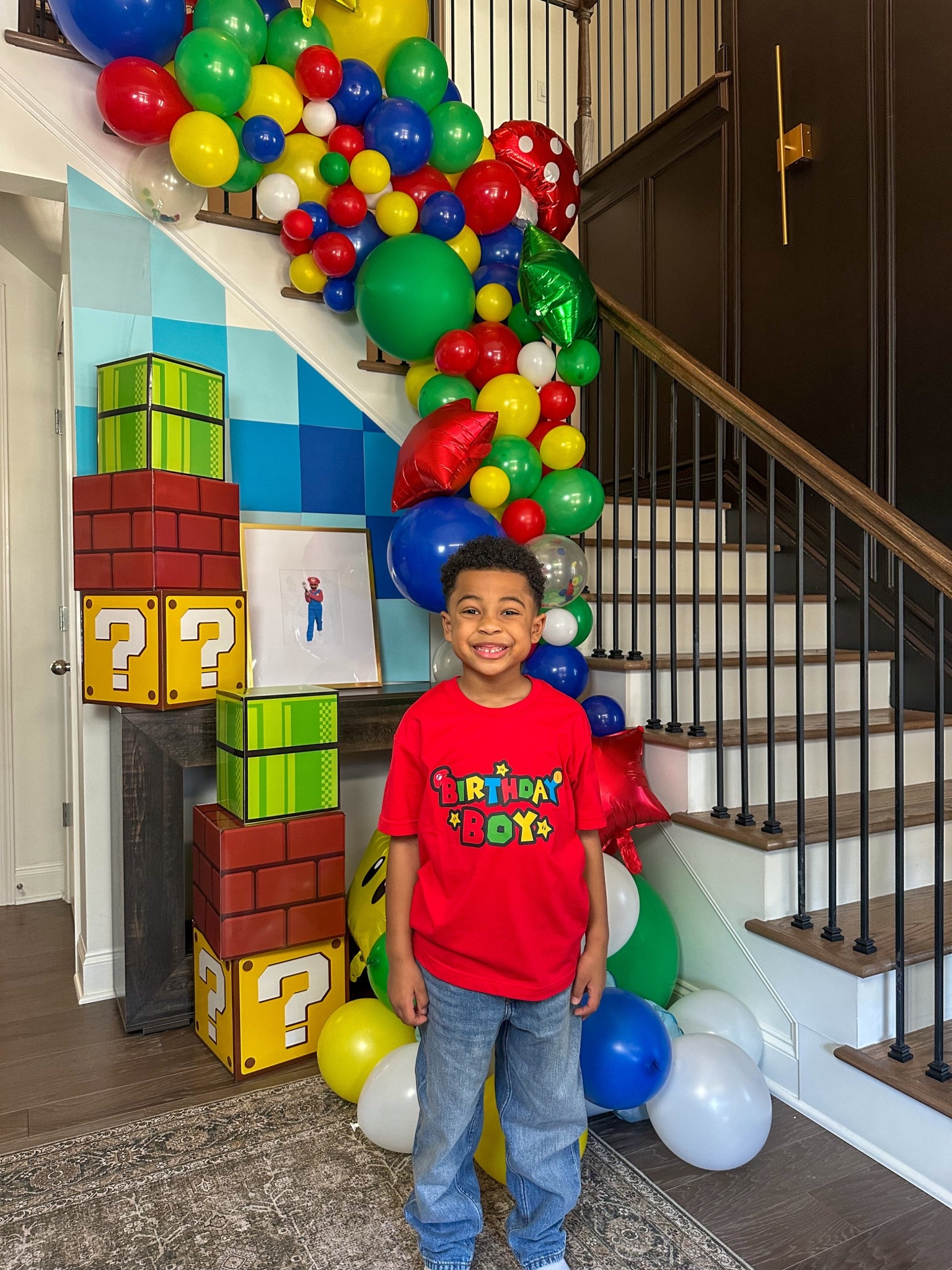 My big boy loved his Super Mario themed birthday party. 

Shop this balloon arch and other decor from his party. 