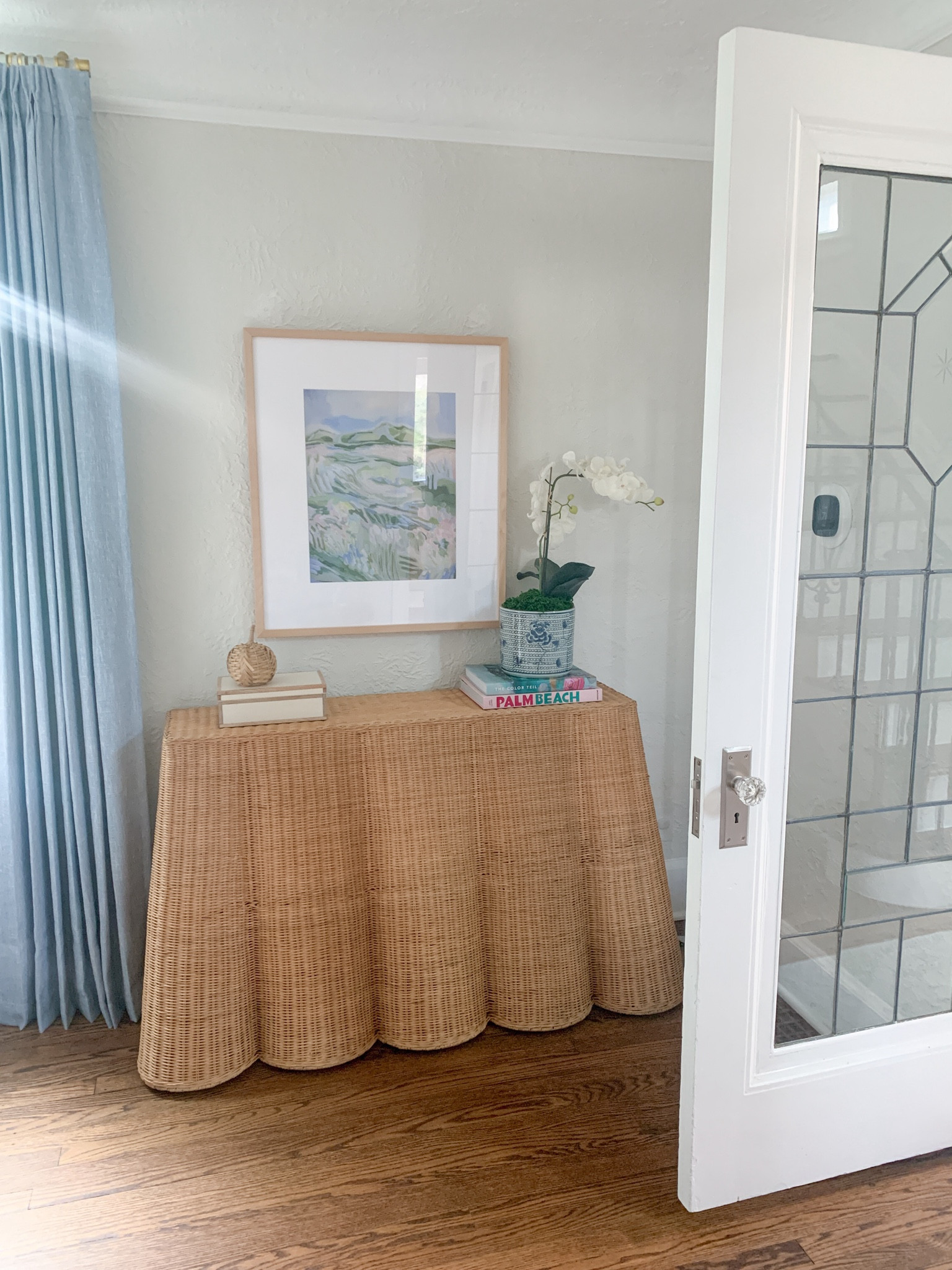 Beyond obsessed with this scallop wicker table I just got!!

#LTKHome