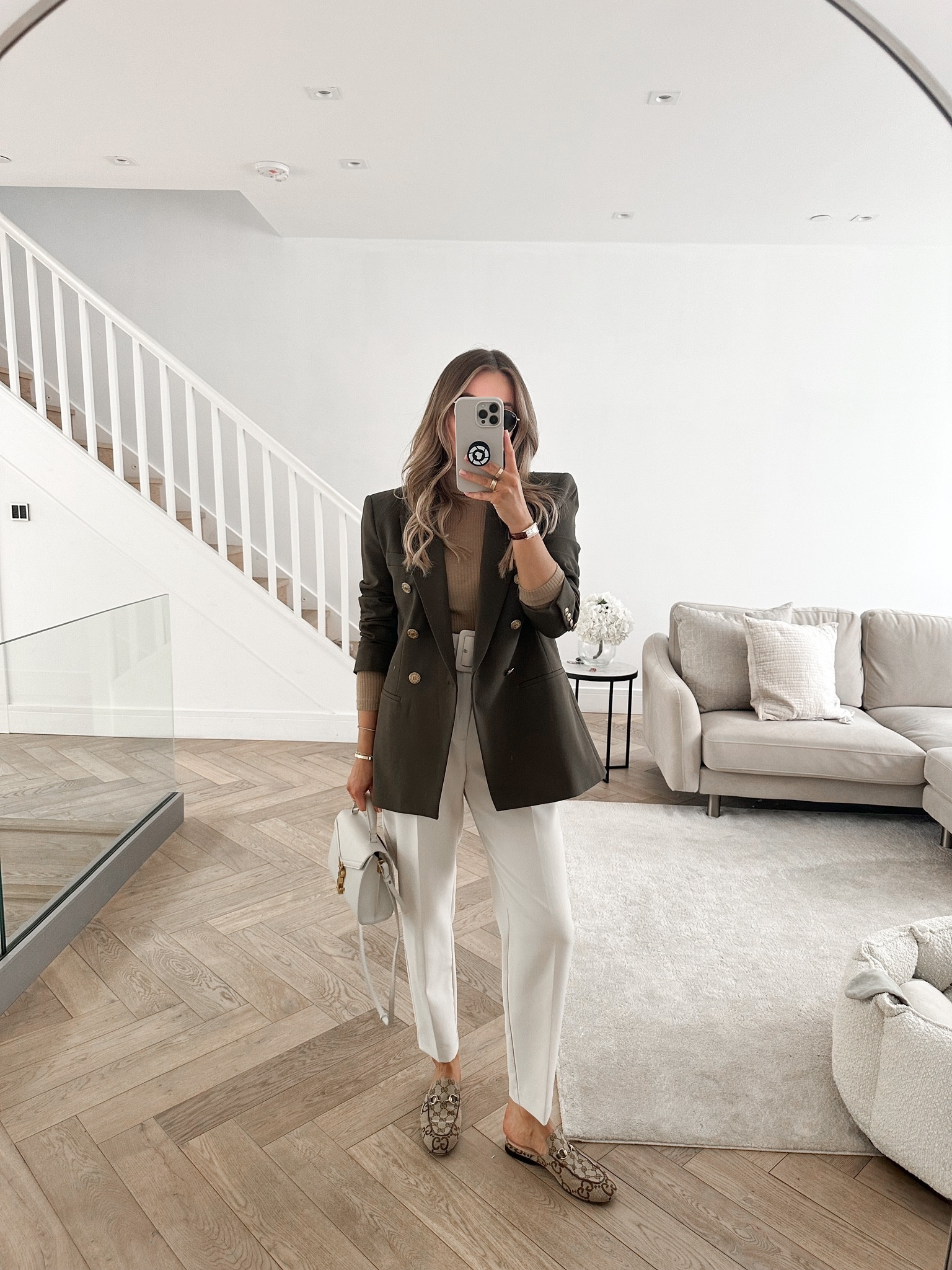 Cream & khaki spring outfit - beige belted tailored trousers, Gucci princetown loafers, beige mock neck top, khaki military blazer, Saint Laurent cream handbag, Rayban round sunnies 

#LTKSeasonal #LTKstyletip #LTKeurope