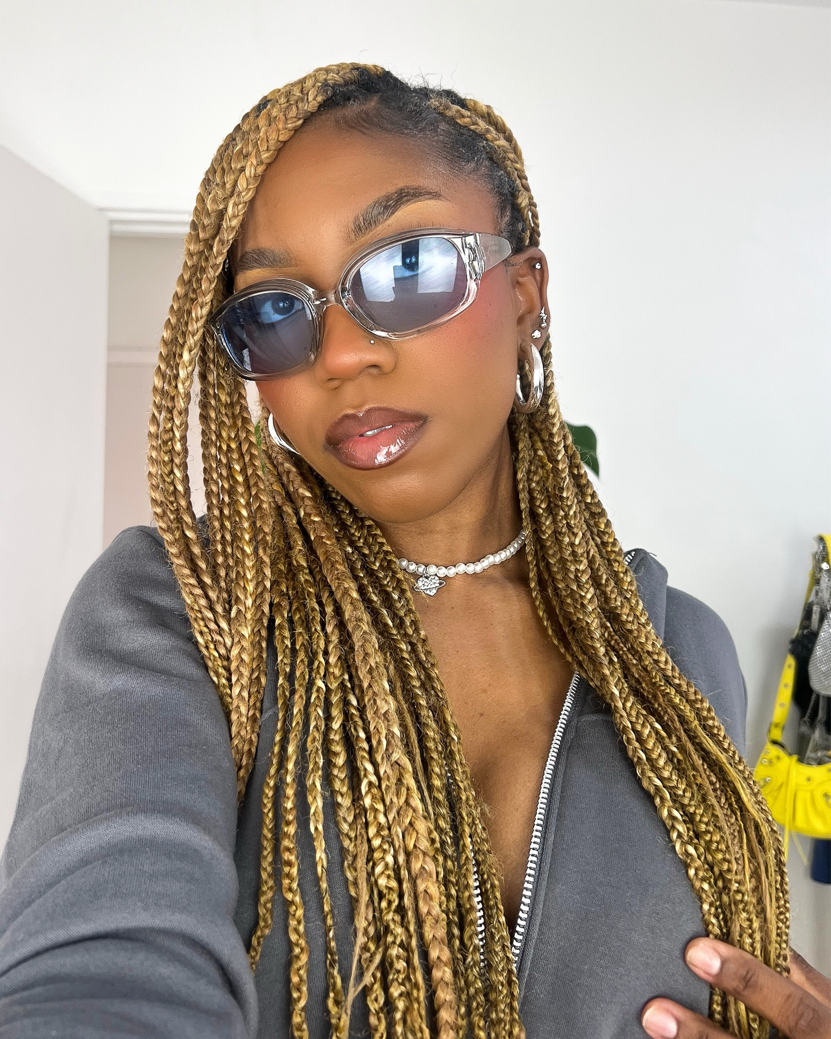 Blue lens sunglasses. Y2K aesthetic. Y2K sunglasses. Blue sunglasses. Clear lens sunglasses. Trendy sunglasses. Pearl necklace. Fenty Beauty gloss bomb cream fenty glow. Nude lipgloss. Statement accessories. Silver accessories. Tinted lens fashion sunglasses. 

#LTKfit #LTKbeauty #LTKstyletip