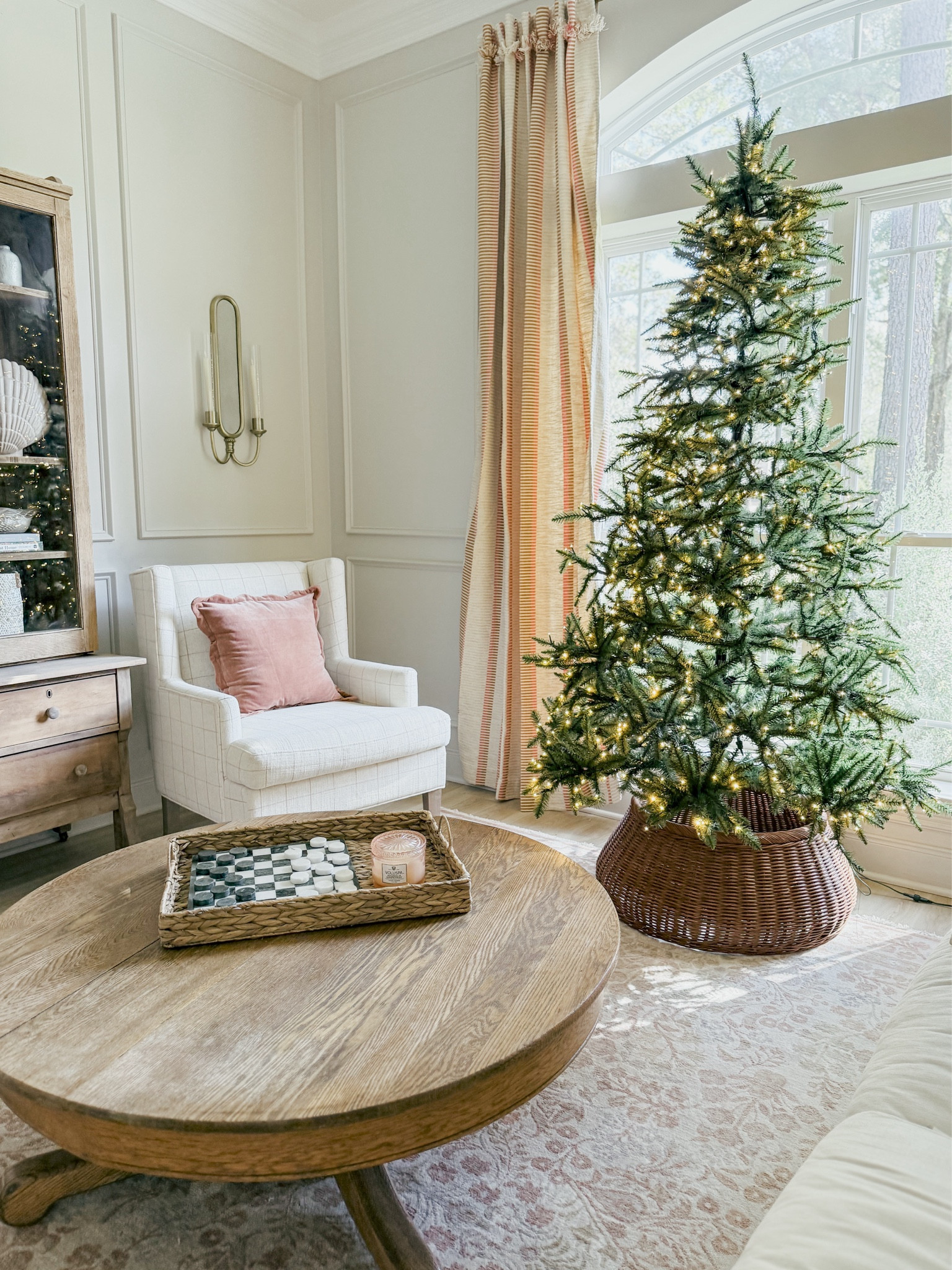 I was super skeptical when we were setting this tree up but I LOVE IT! You can’t beat the price! So easy to set up! No mess! Multiple light settings!! 👏🏻👏🏻👏🏻 

THEBLOOMINGNEST cozy Christmas decor rug chair pillow Christmas tree curtains living room 

#LTKHoliday #LTKHome #LTKSeasonal